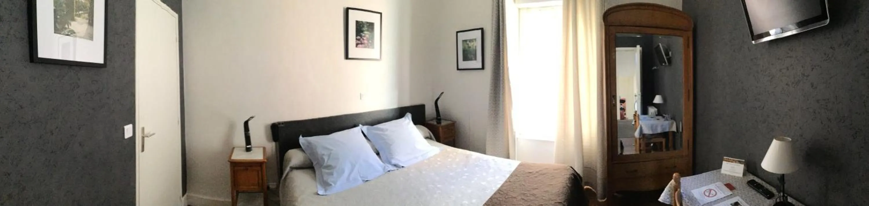 Photo of the whole room, Bed in Hôtel Restaurant Les Touristes