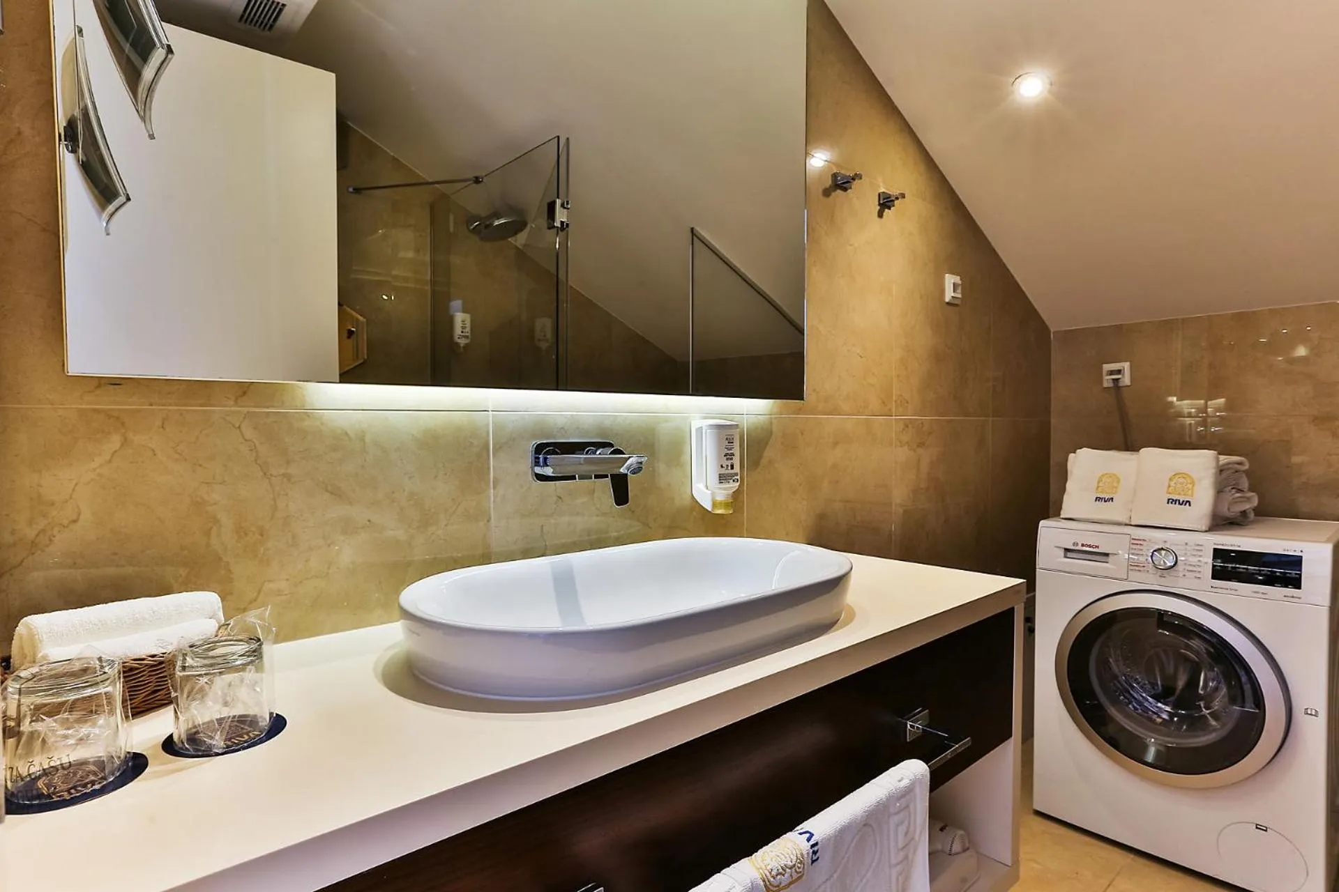 Bathroom in Hotel Riva by Aycon