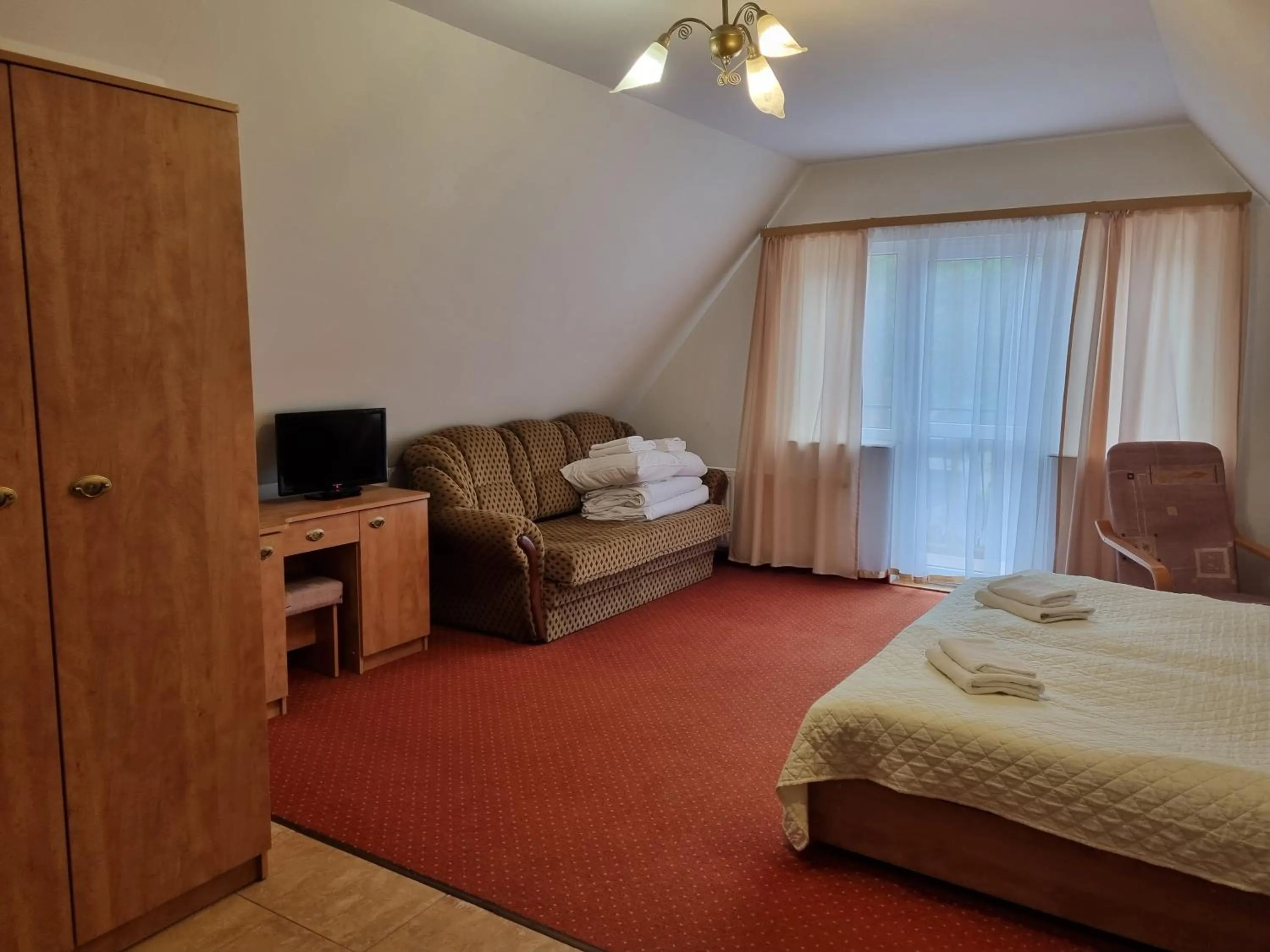 Communal lounge/ TV room in Paradiso Park