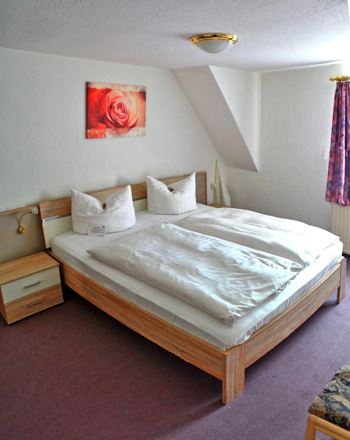 Photo of the whole room, Bed in Hotel Schwarzes Ross Siebenlehn