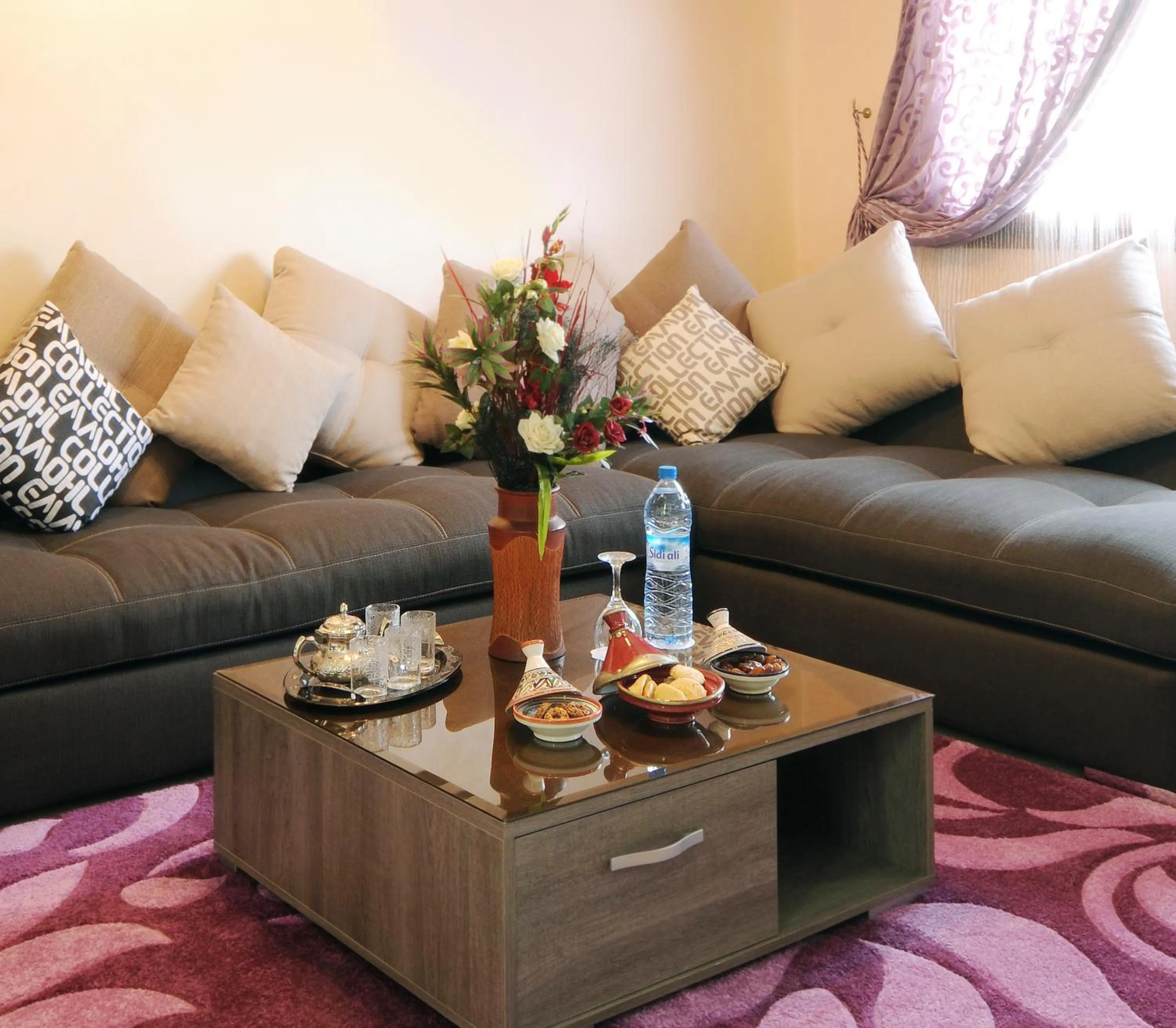 Communal lounge/ TV room in Aparthotel Les Oliviers Suites & Spa