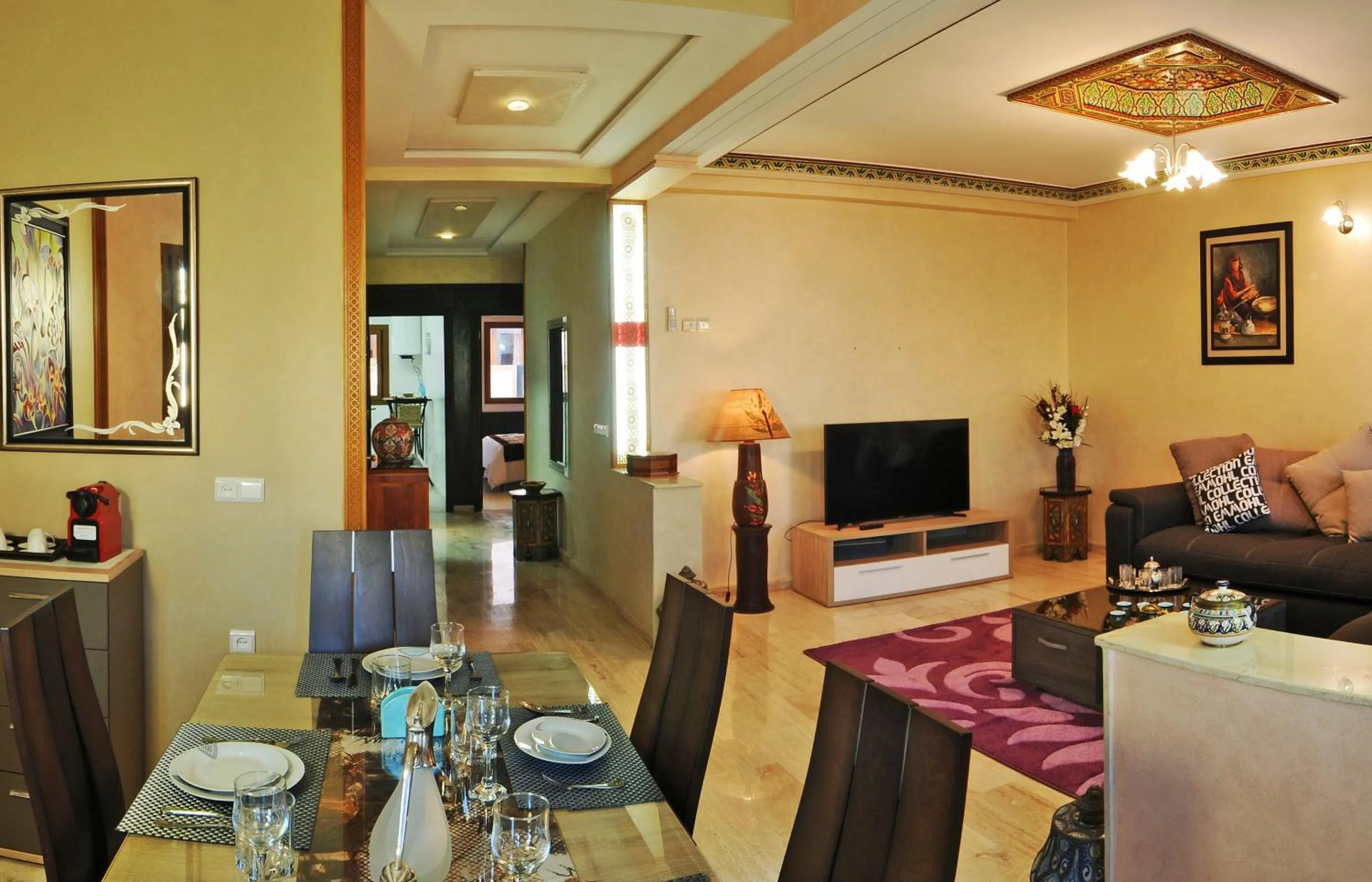 Communal lounge/ TV room in Aparthotel Les Oliviers Suites & Spa