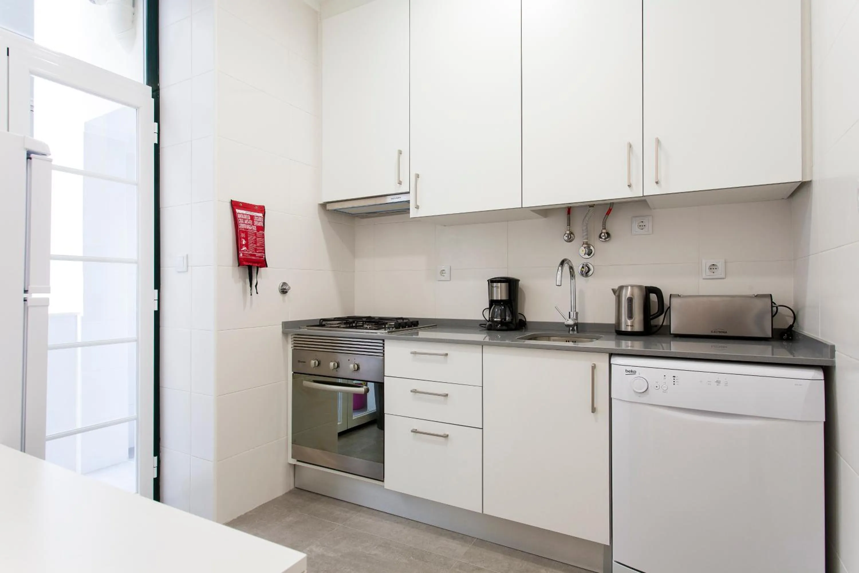 Kitchen or kitchenette in Central Downtown by Central Hill Apartments