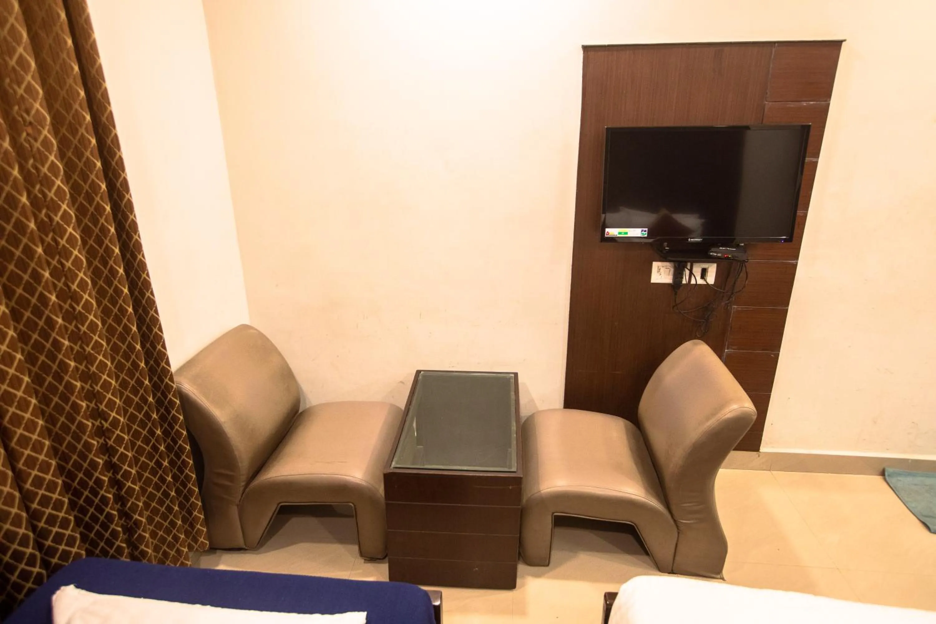 Seating area in Orion Residency Hotel Near Chennai Central Railway Station