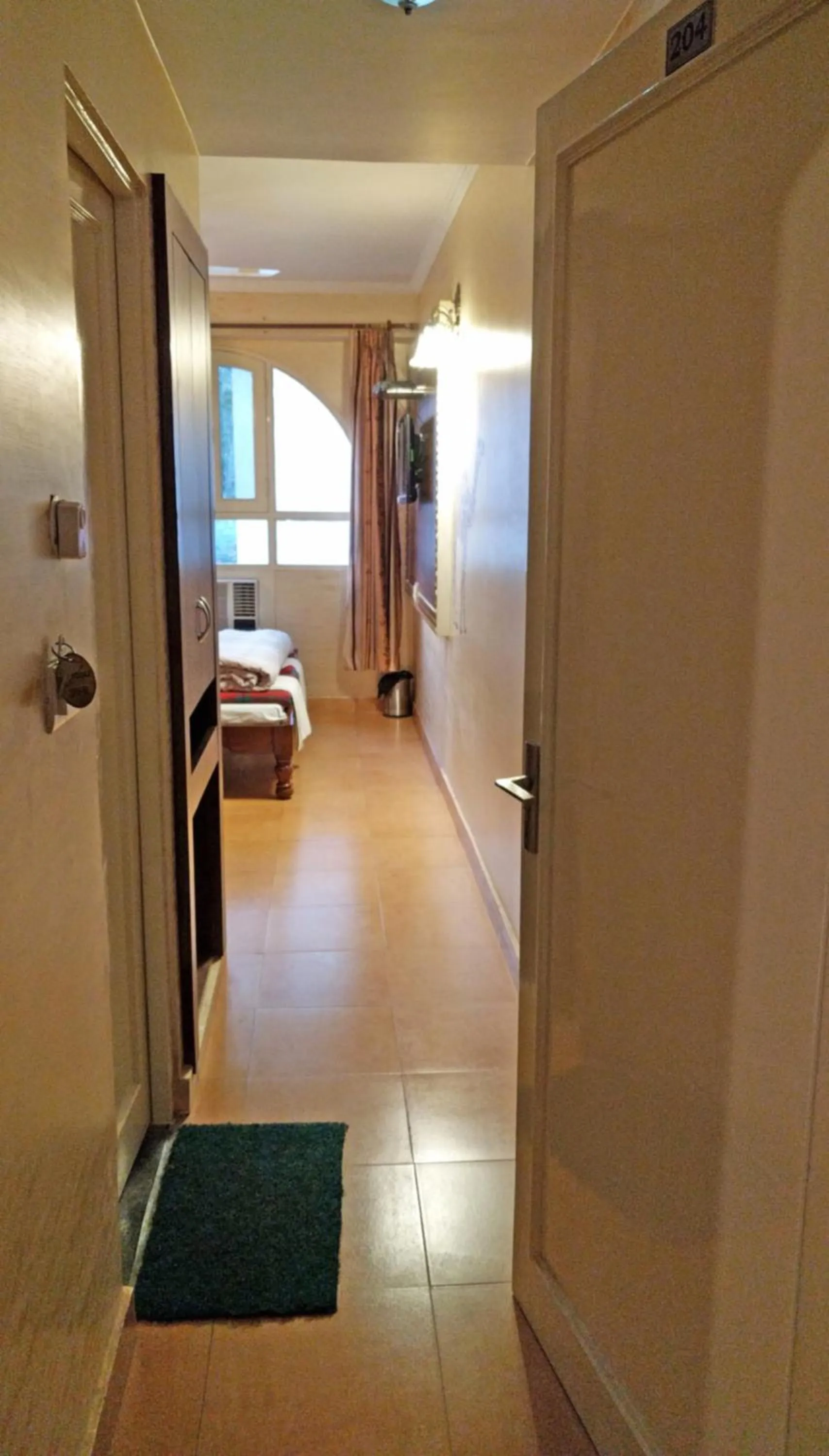 Bed in Hotel Rangoli