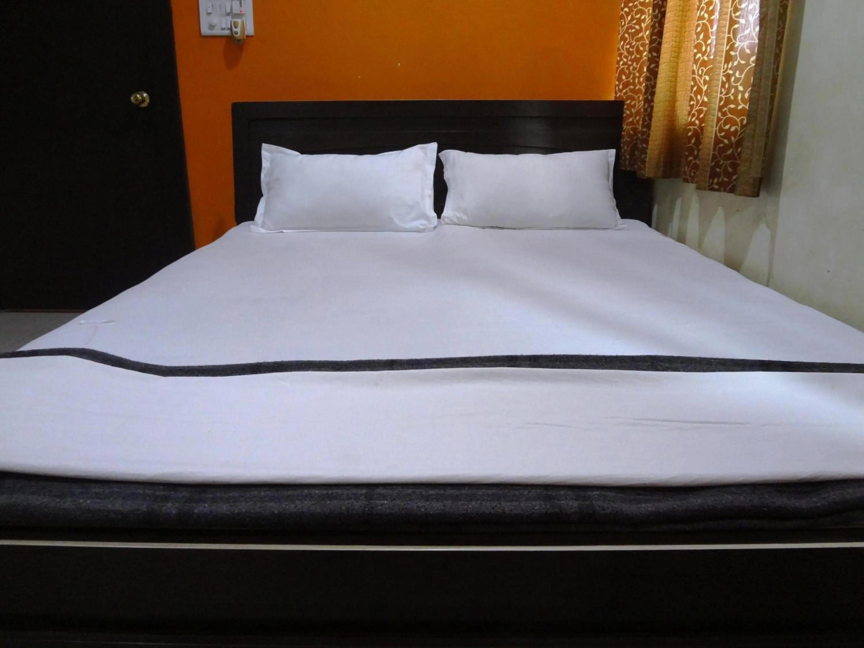 Bed in Hotel Parvati Palace Sehore