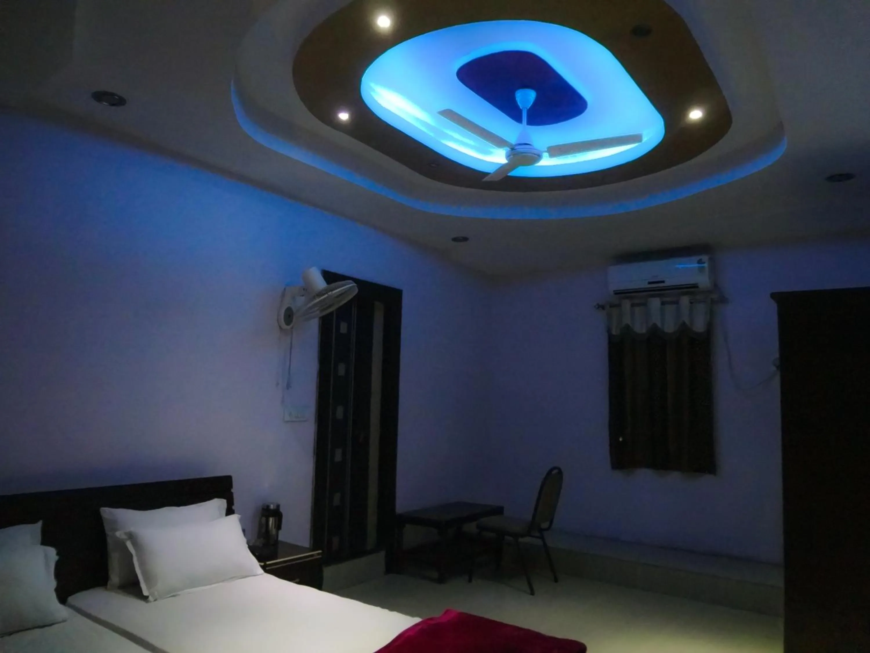 Bed in Hotel Parvati Palace Sehore