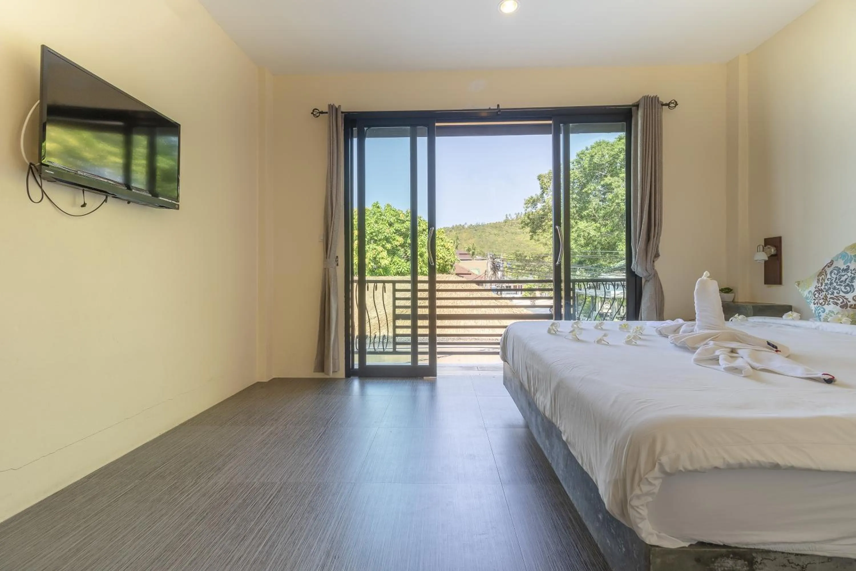 TV and multimedia, Bed in New Heaven Dive School and Resort