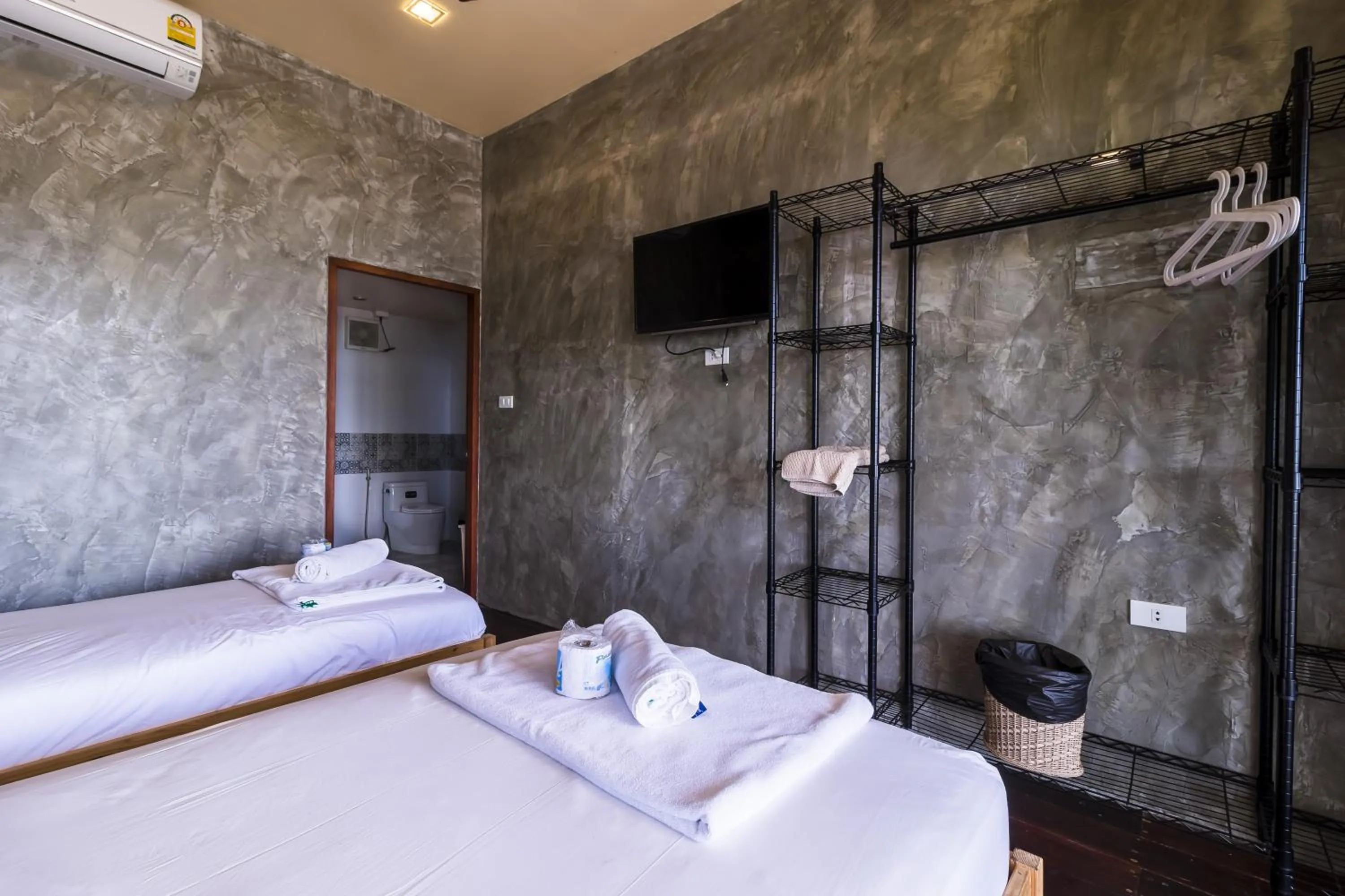 Patio, Bed in New Heaven Dive School and Resort