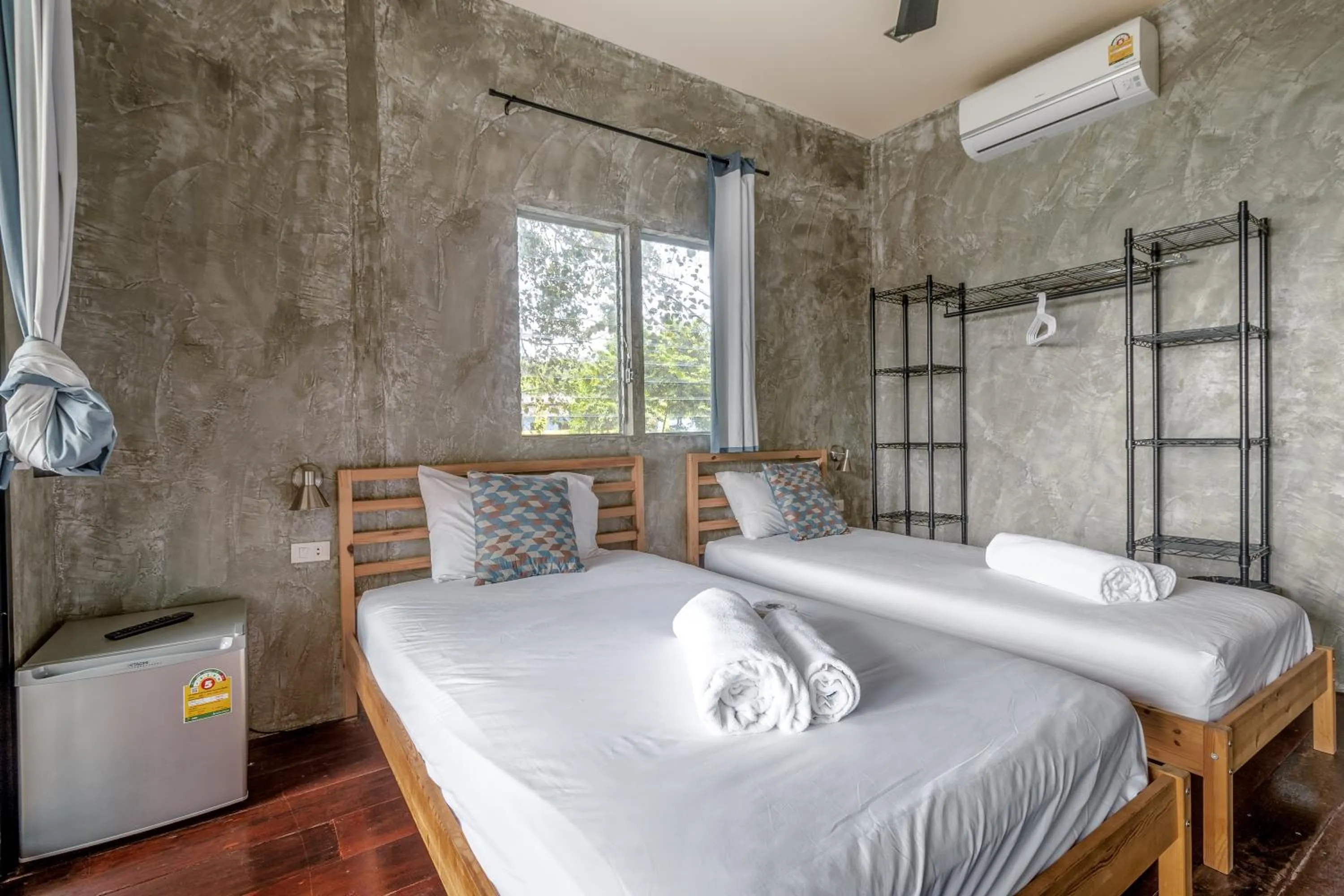 Bed in New Heaven Dive School and Resort