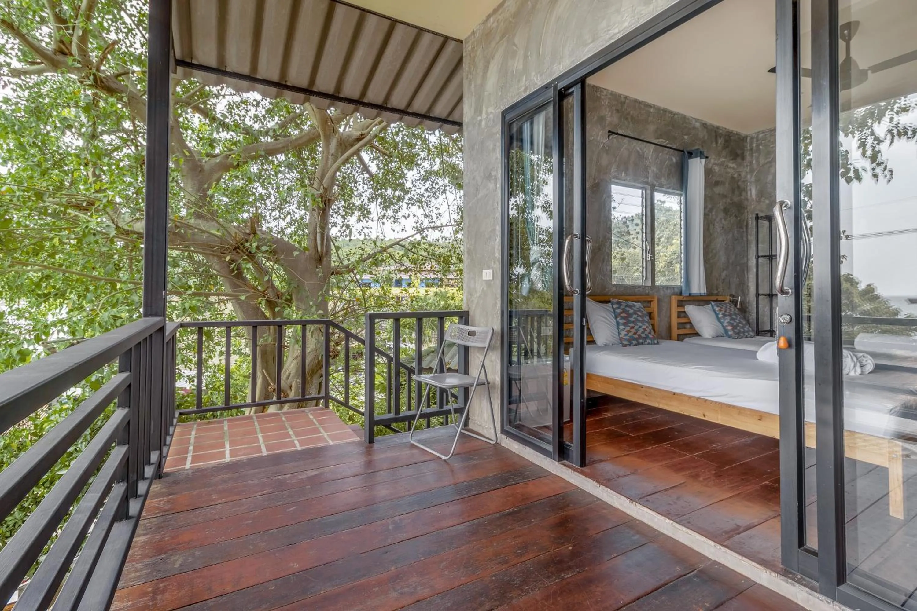 Bed in New Heaven Dive School and Resort