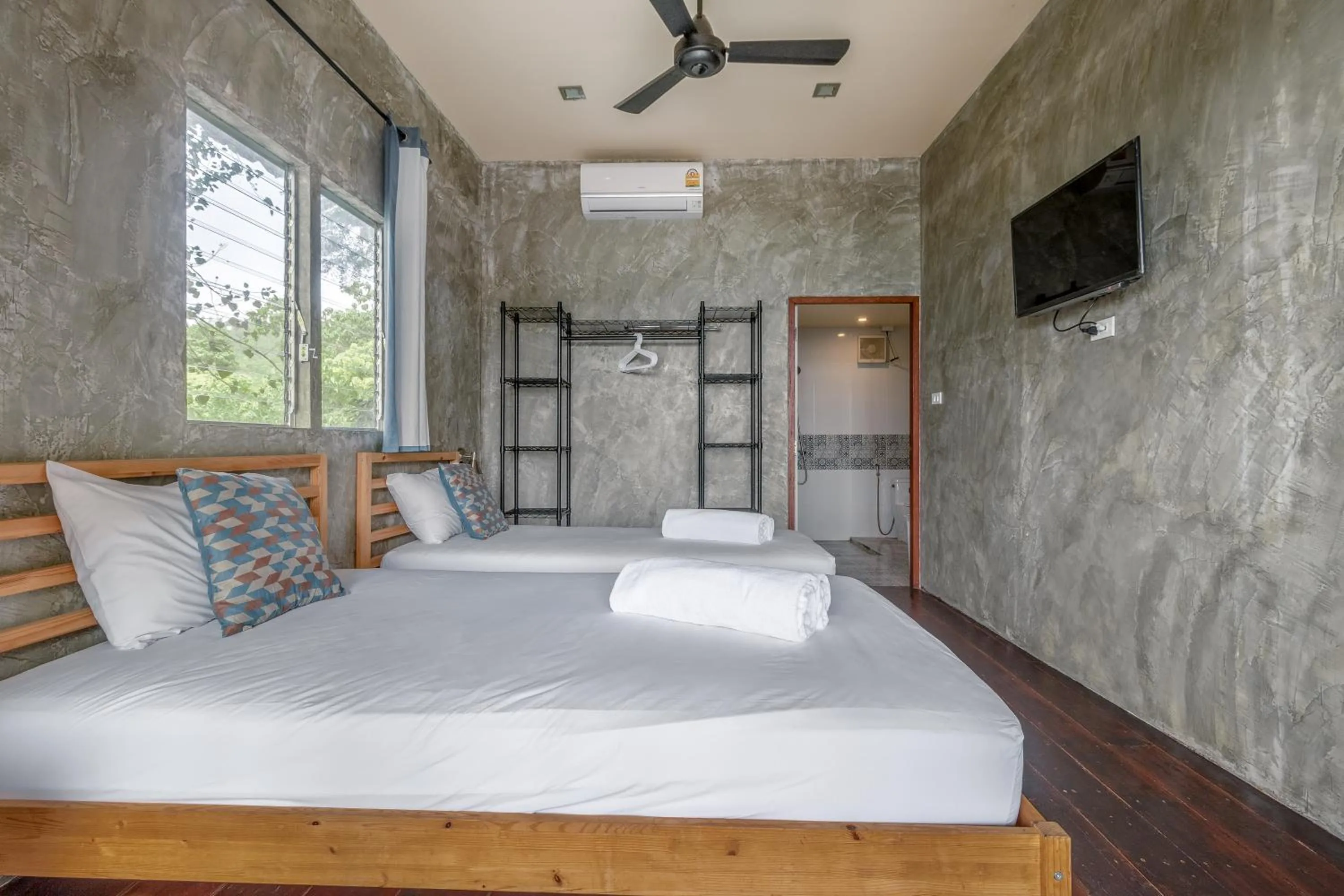 Bed in New Heaven Dive School and Resort