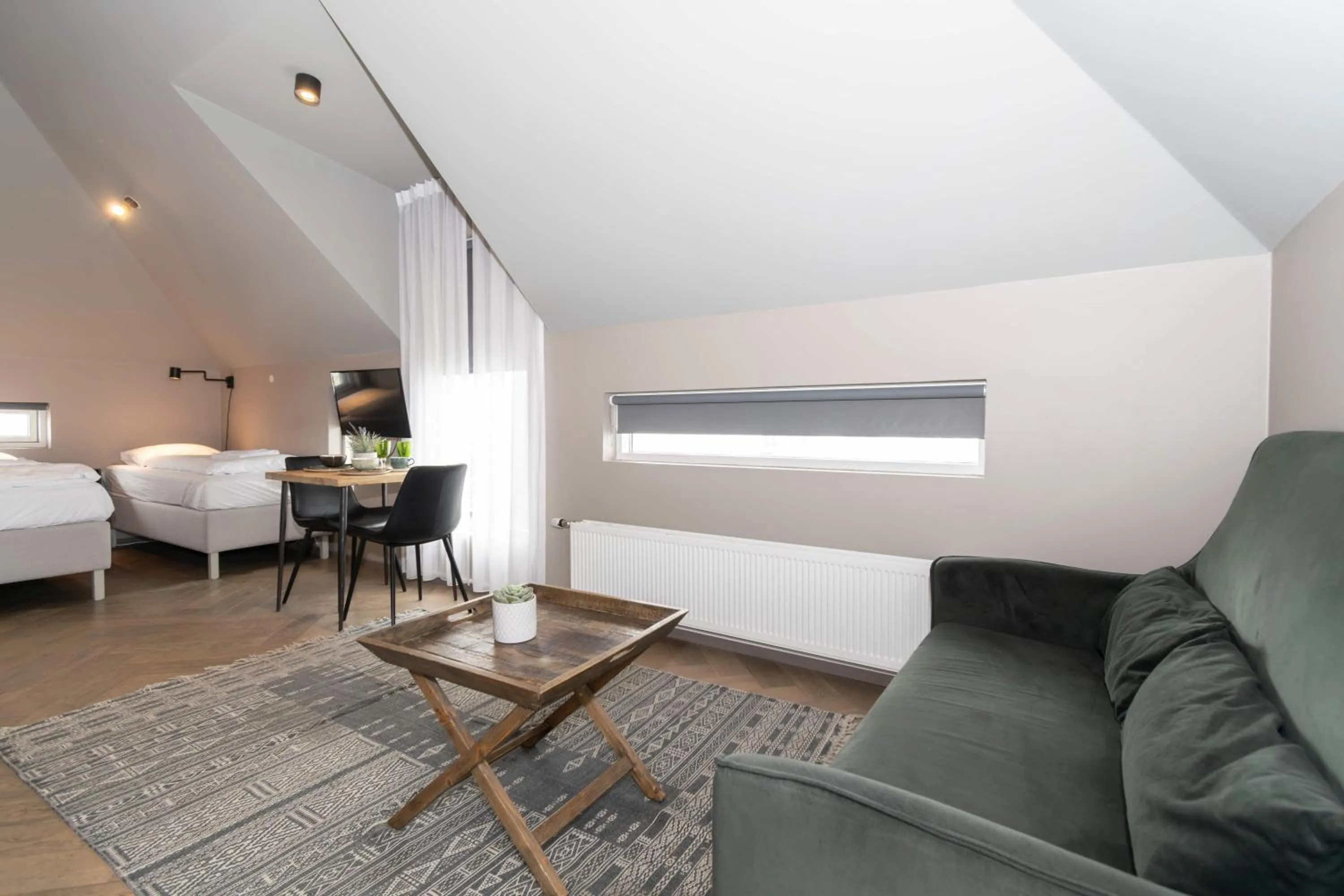 Living room, Bed in Saga Studios by Heimaleiga