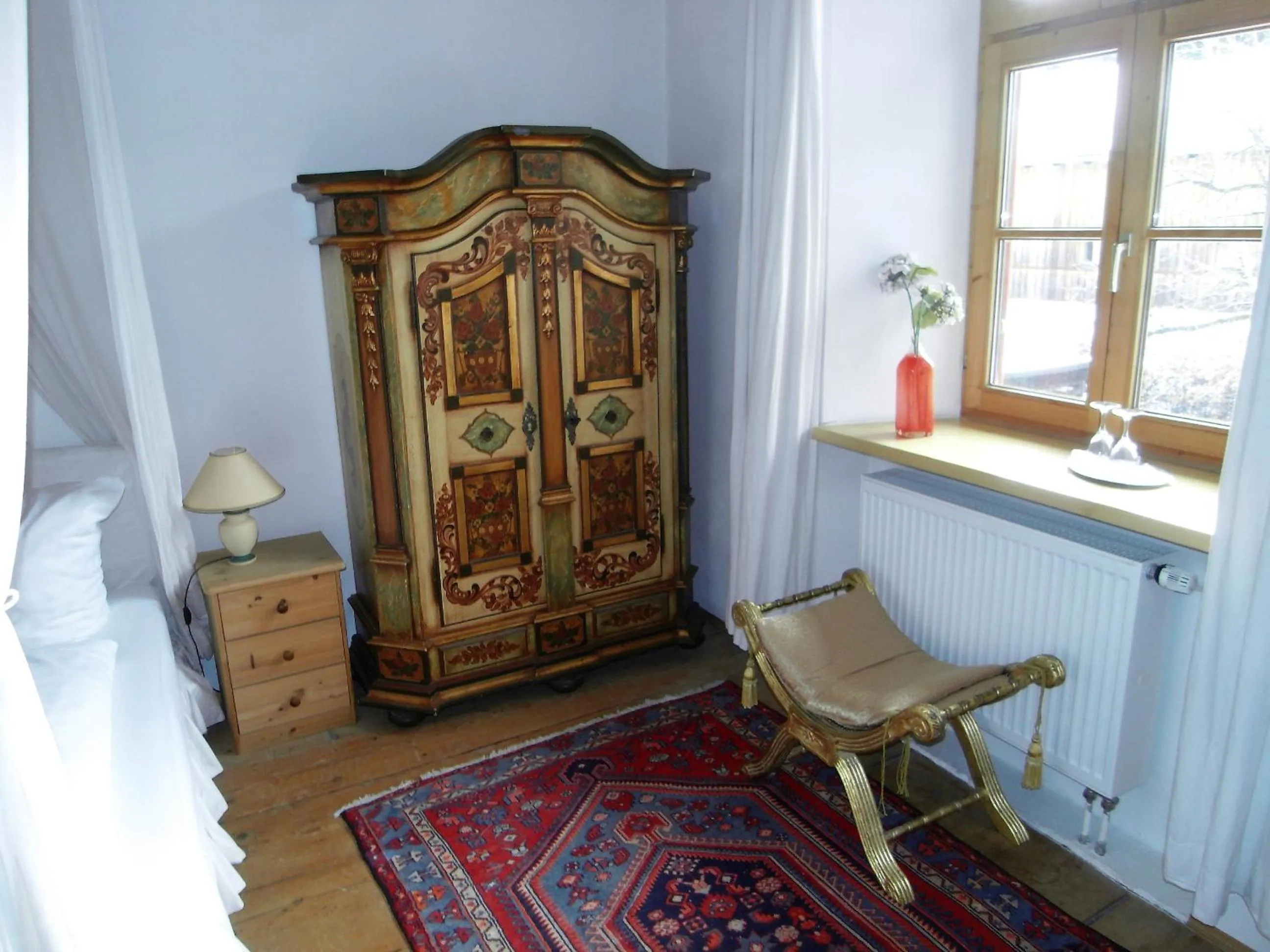 Decorative detail, Bed in Posthotel Sachrang
