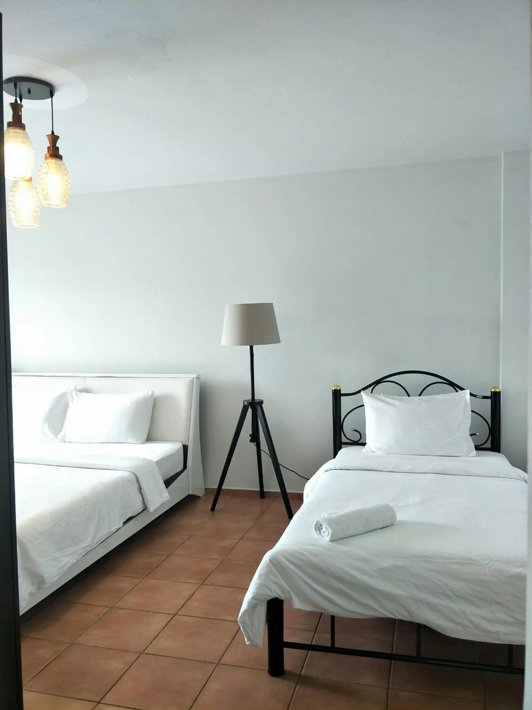 Bed in Lomsabai Apartments