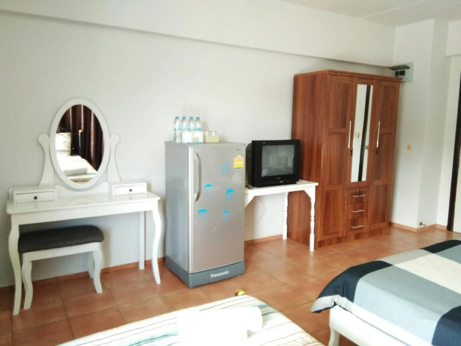 Decorative detail, Bed in Lomsabai Apartments