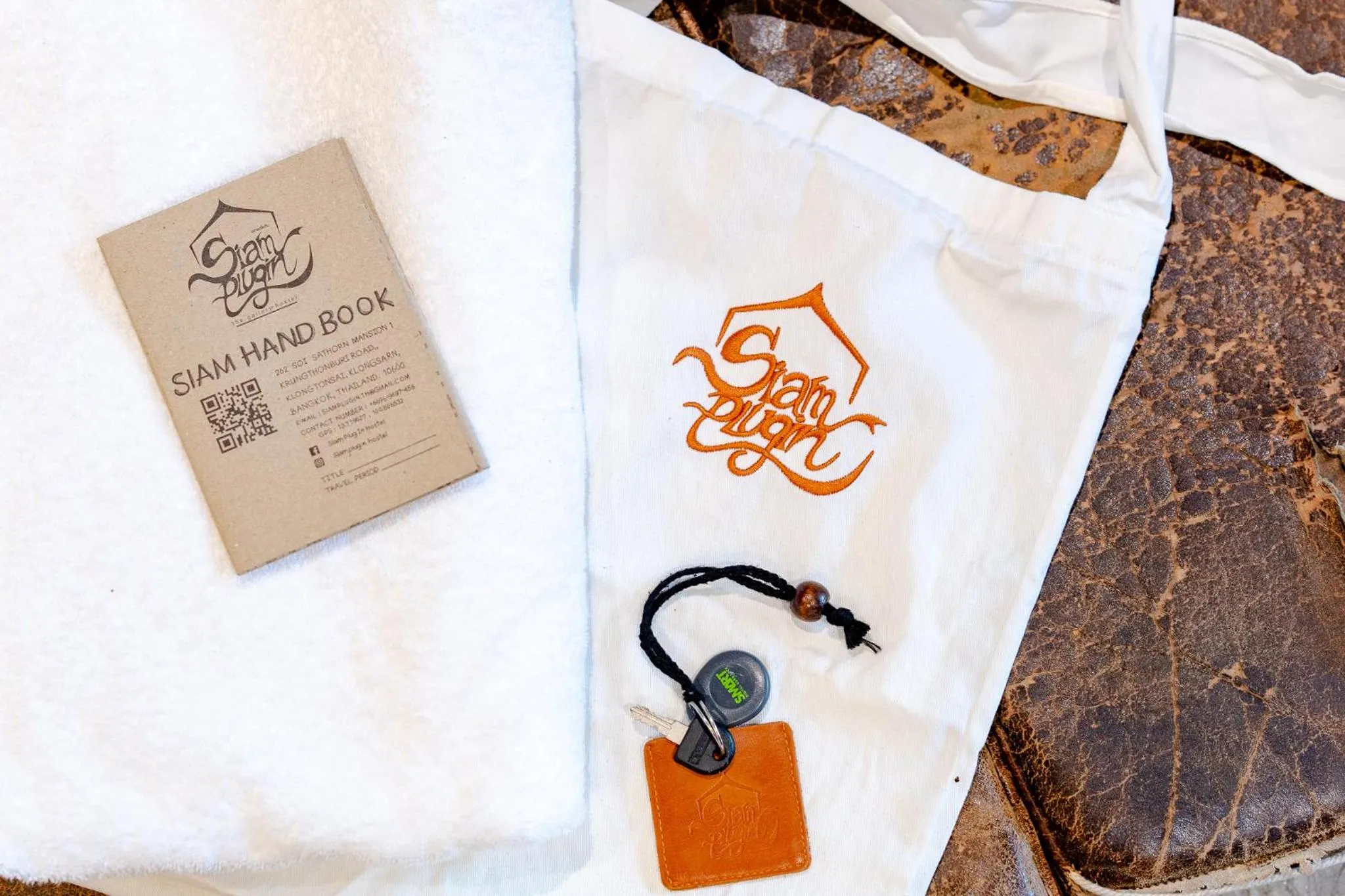 Property logo or sign in Siam Plug In Hostel