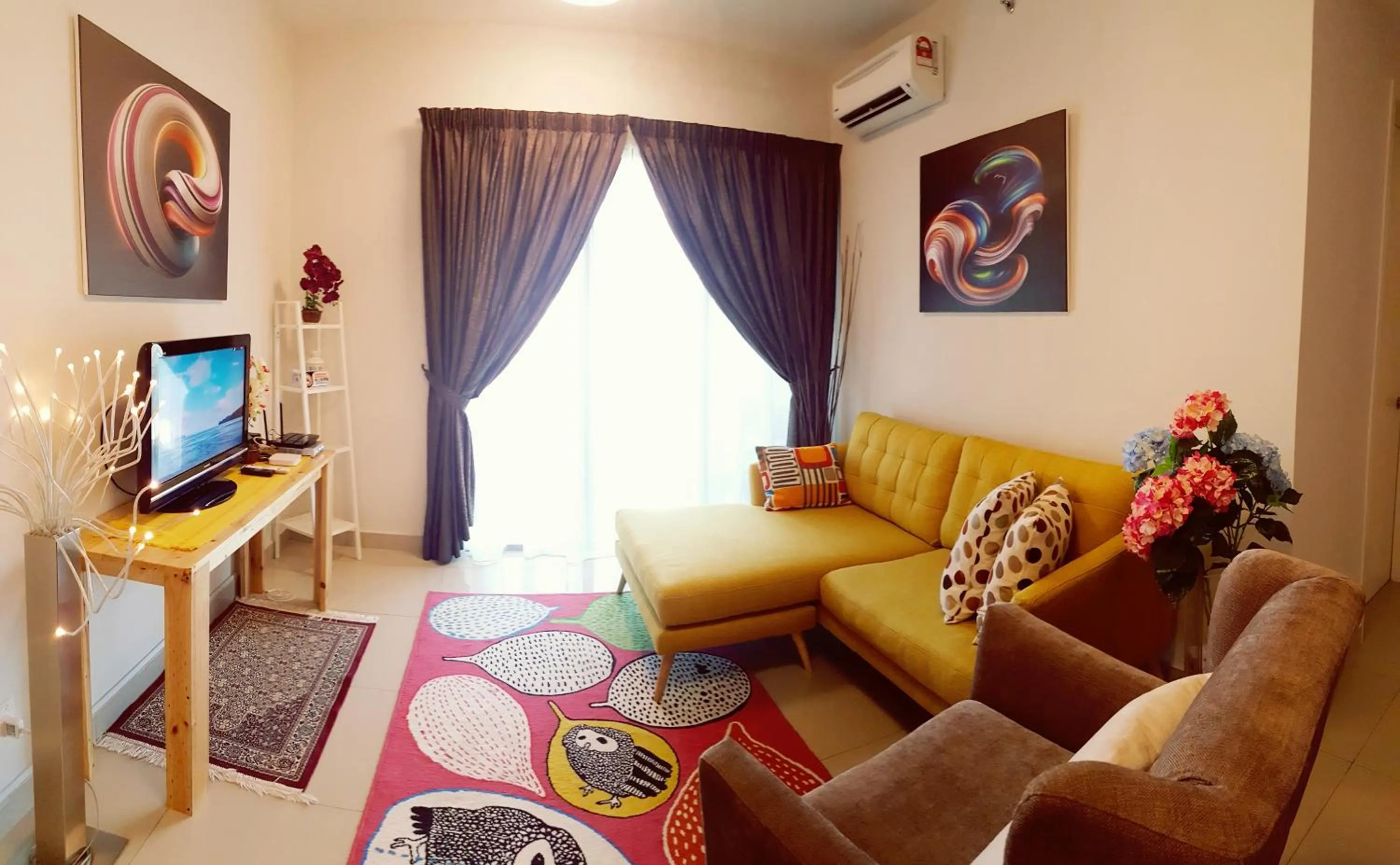 Living room in Skyview Univ360 Place Facing Mines Lake