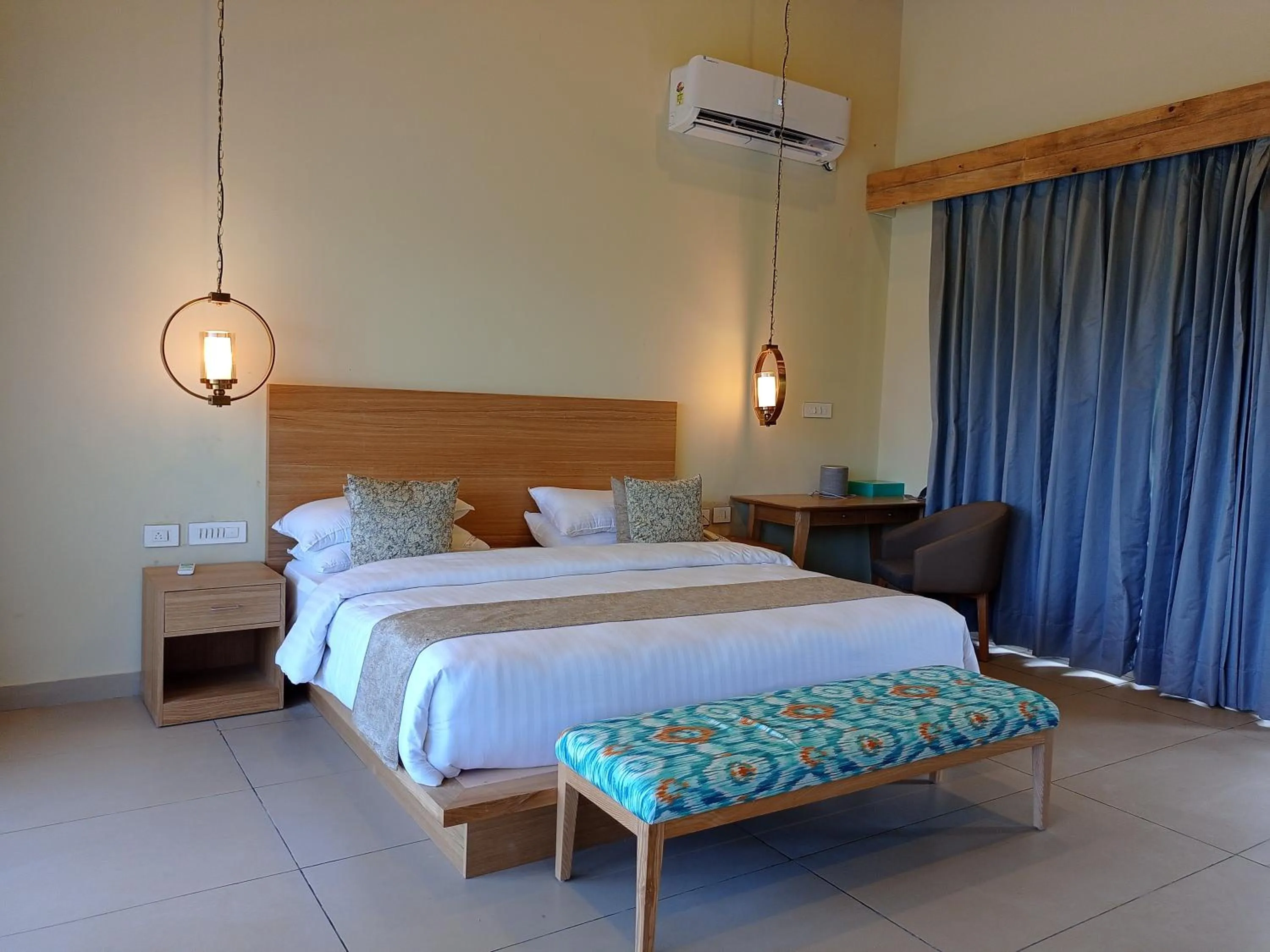 Bed in Rakkh Resort, a member of Radisson Individuals Retreats