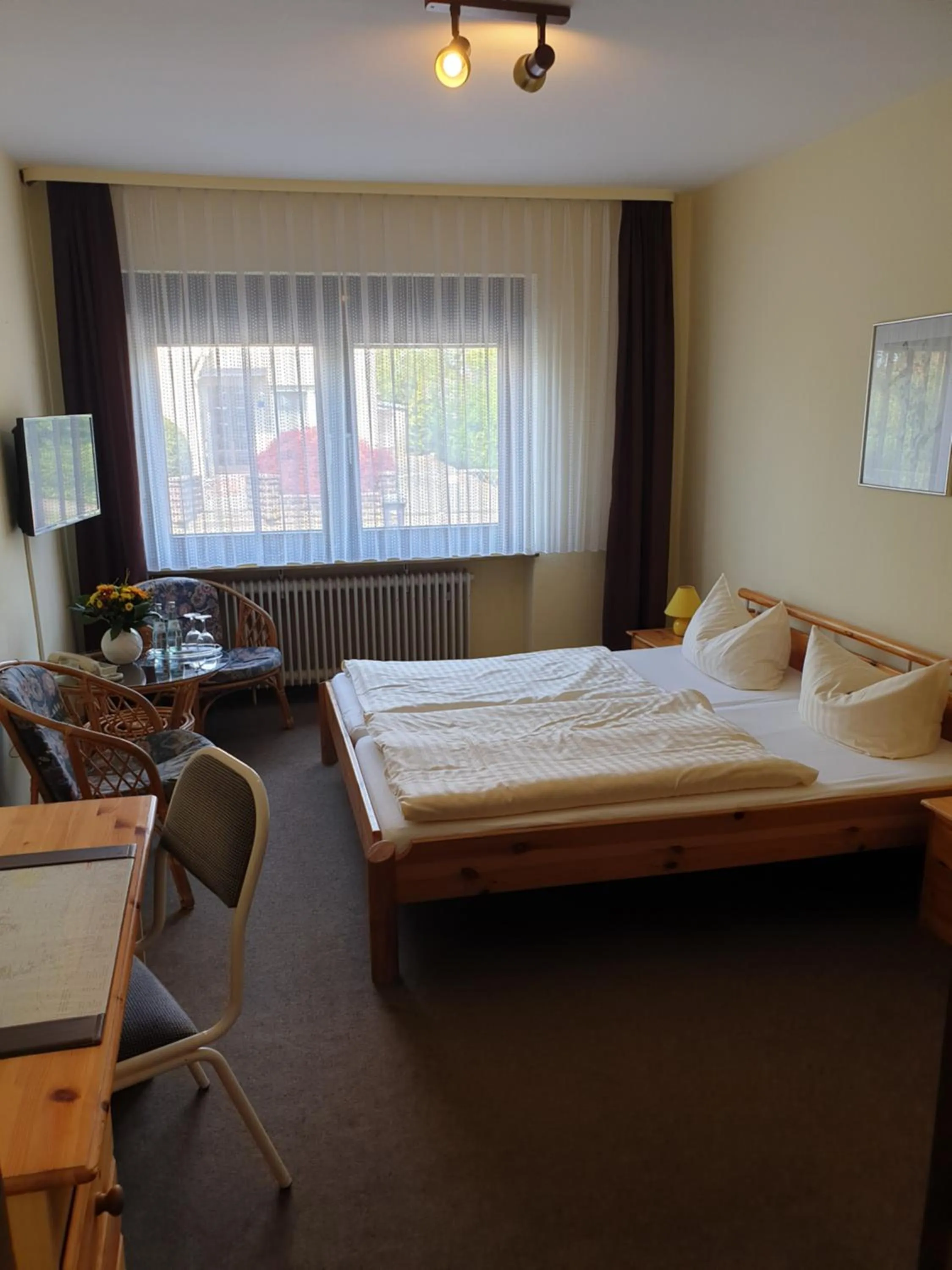 Photo of the whole room, Bed in Heidehotel Anna