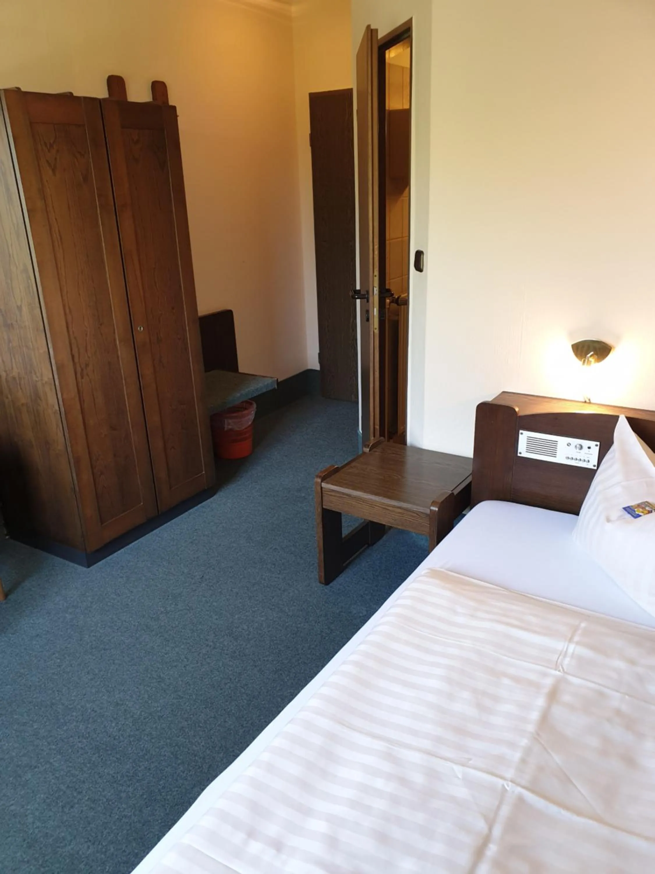 Photo of the whole room, Bed in Heidehotel Anna