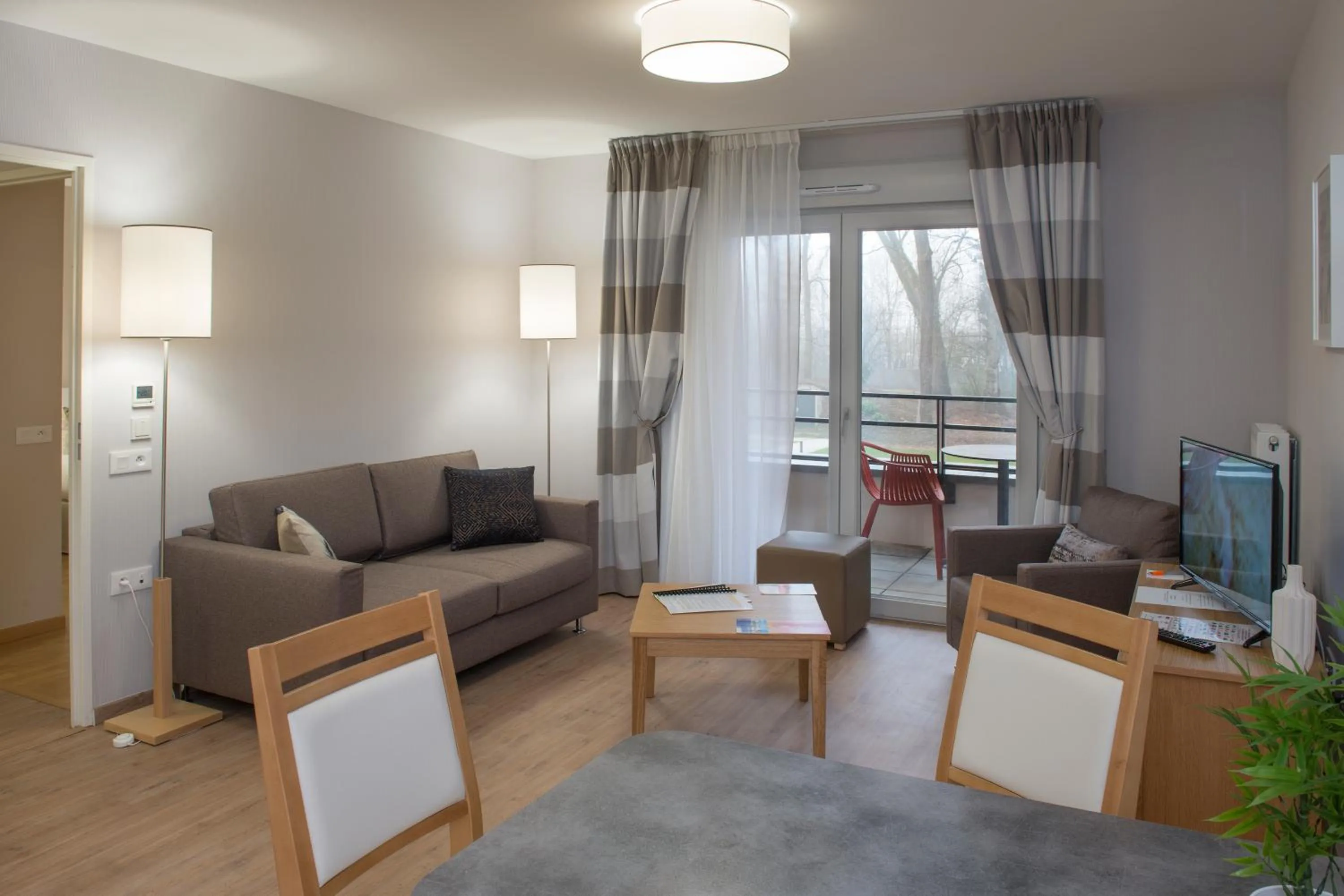 Living room in Domitys - Le Carillon d'or