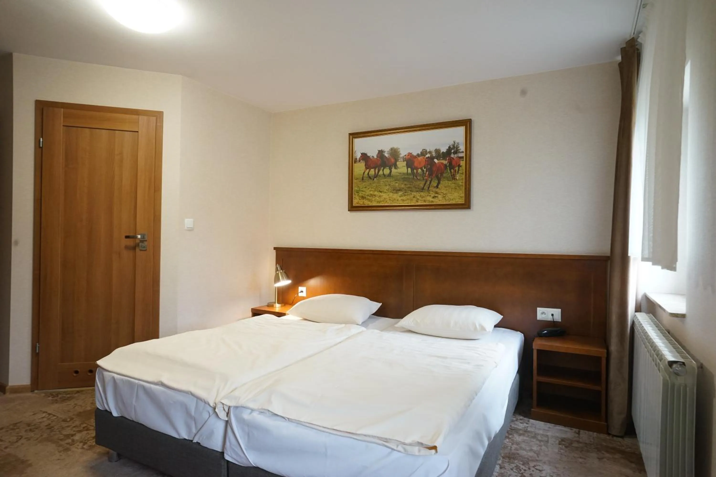 Bed in Hotel Alexandra