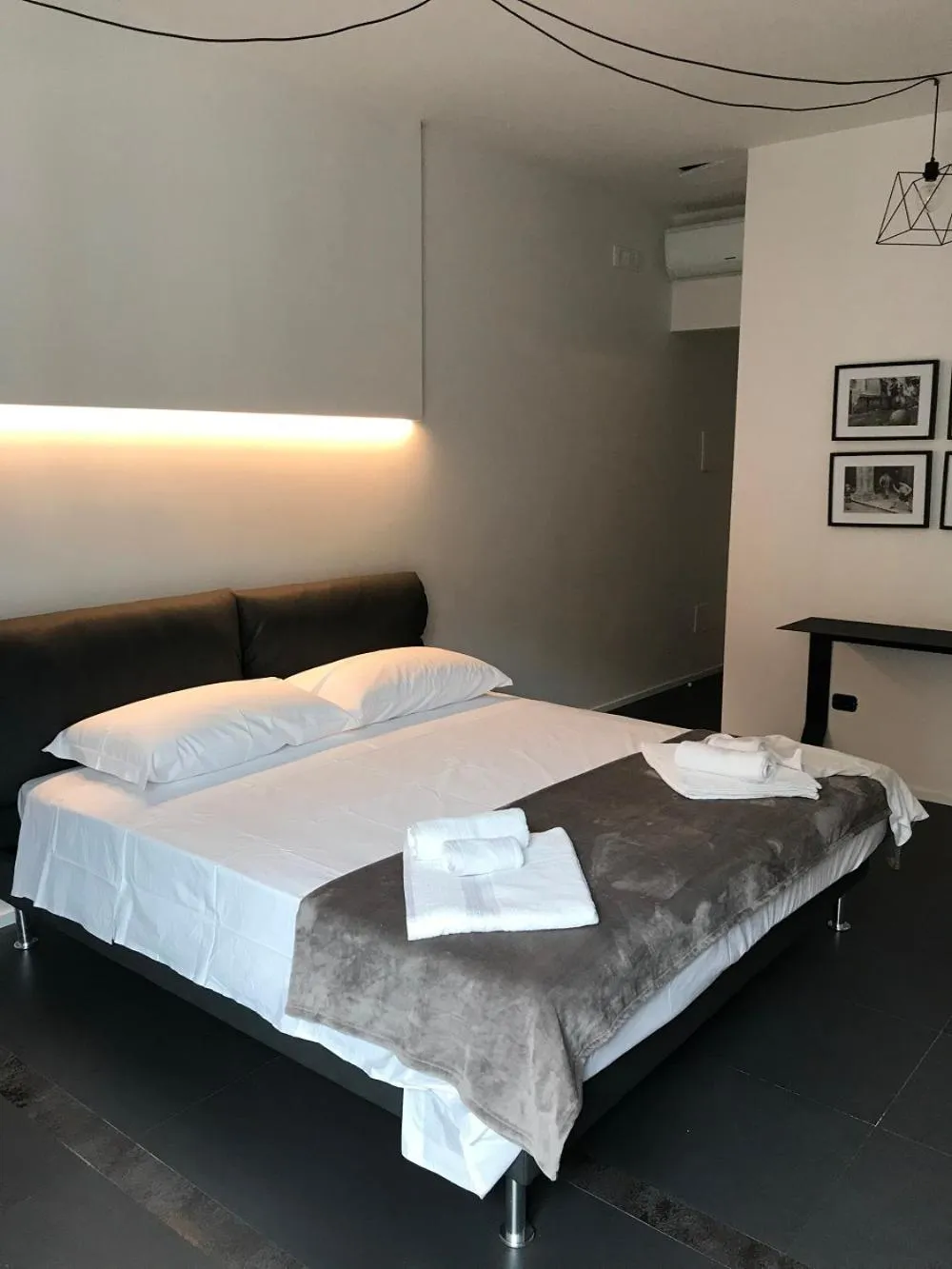 Bed in The Boutique Napoli Suite