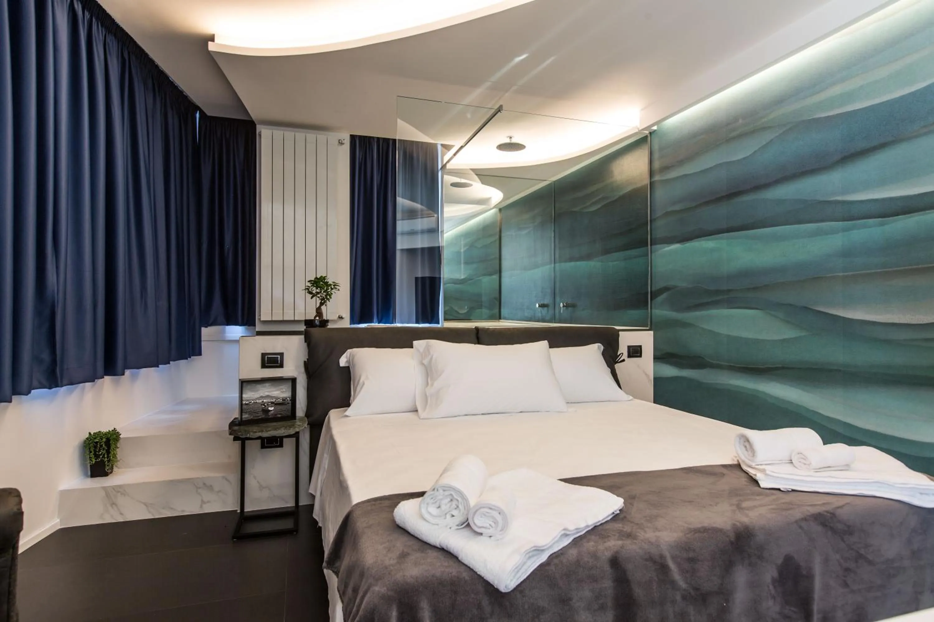 Bed in The Boutique Napoli Suite