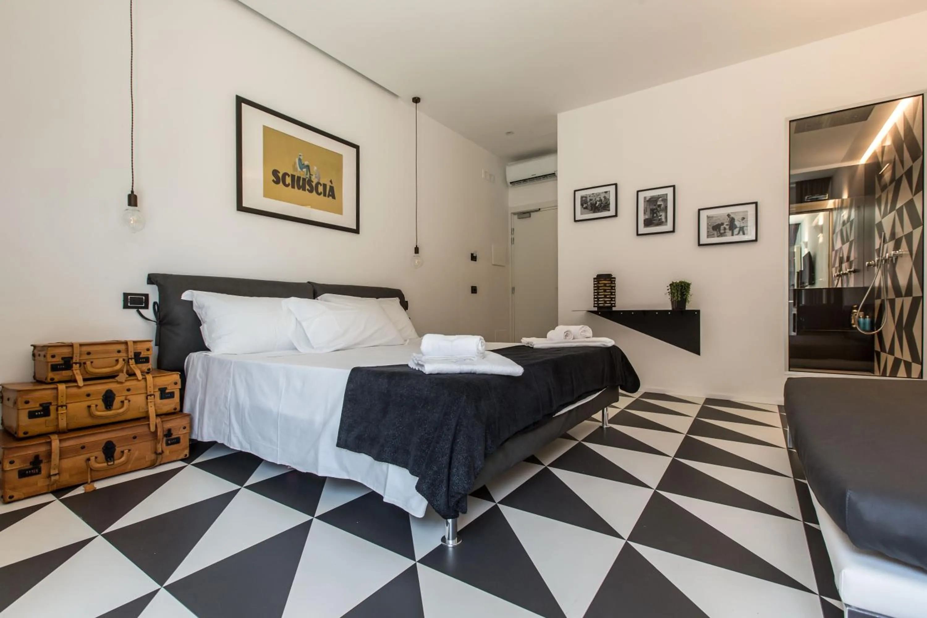 Bed in The Boutique Napoli Suite