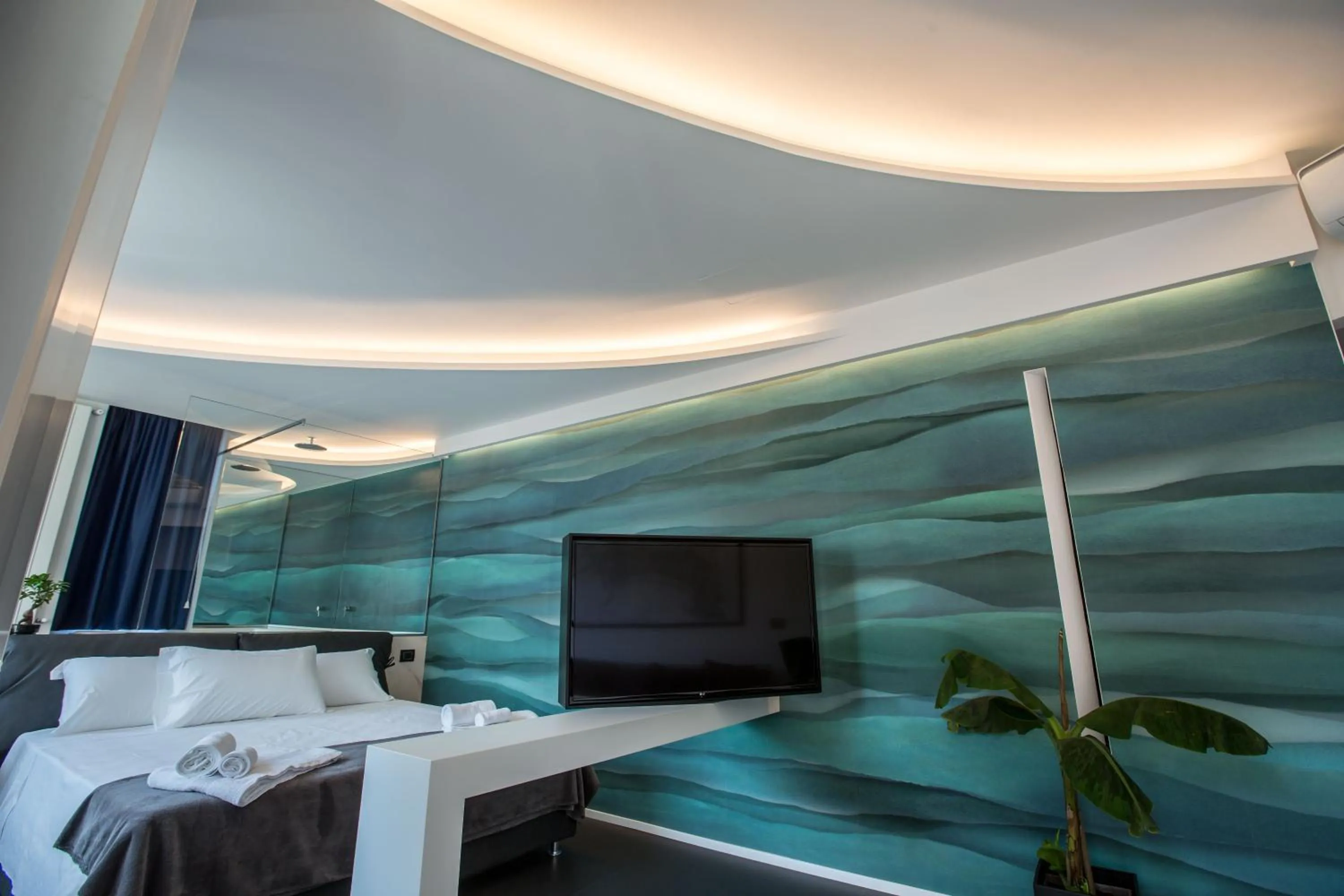 Bed in The Boutique Napoli Suite