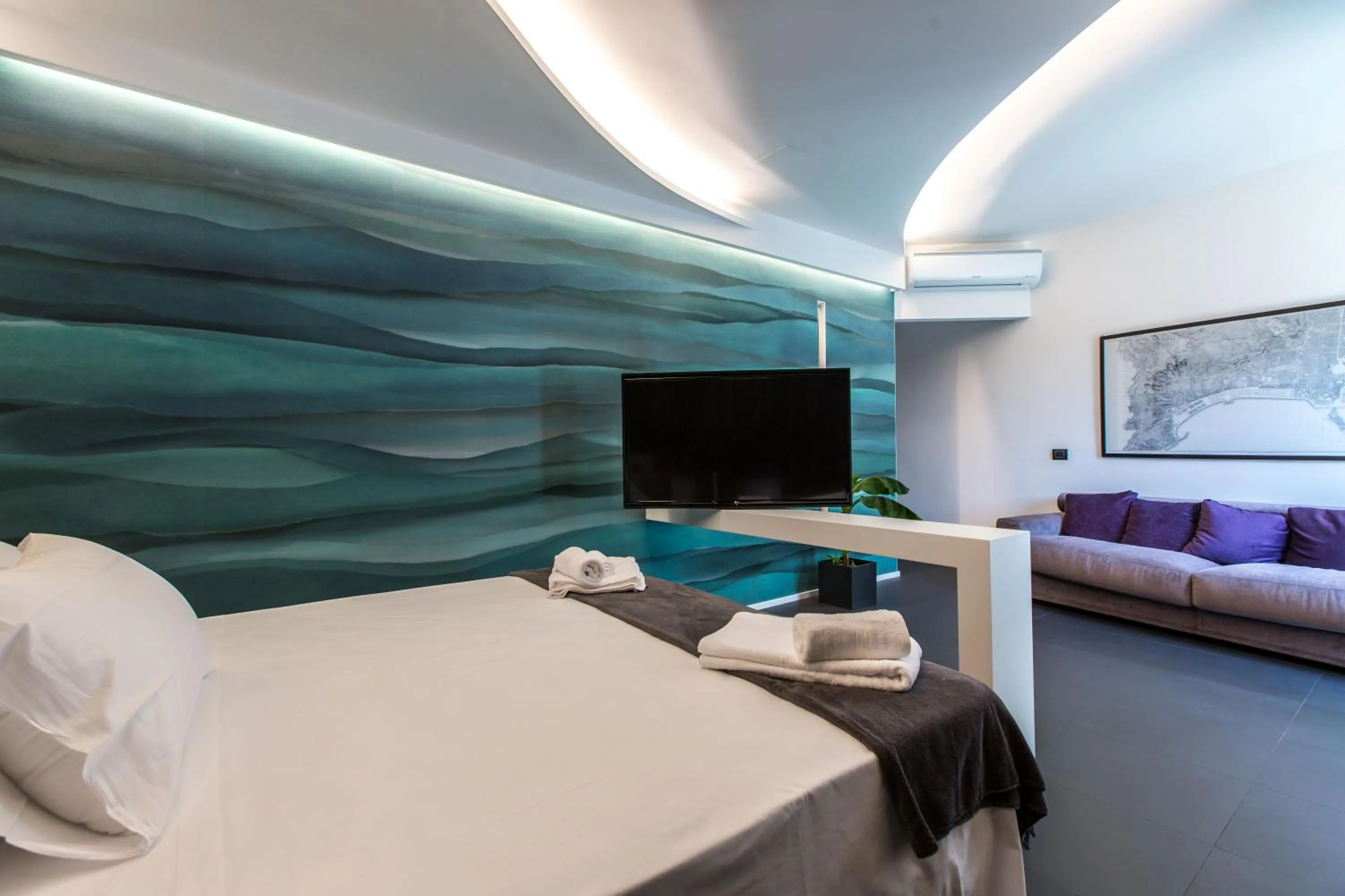 Bed in The Boutique Napoli Suite