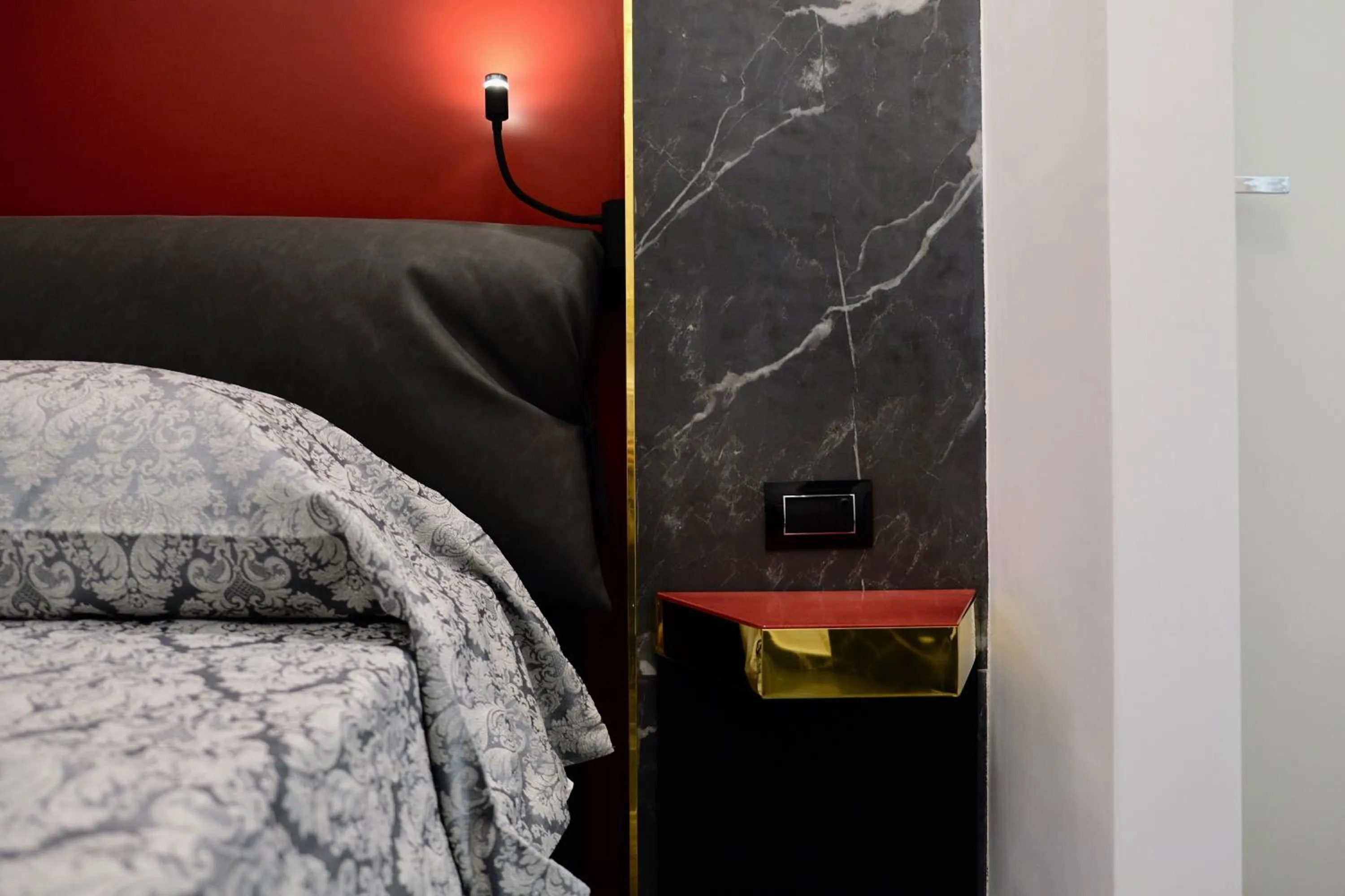 Bed in The Boutique Napoli Suite