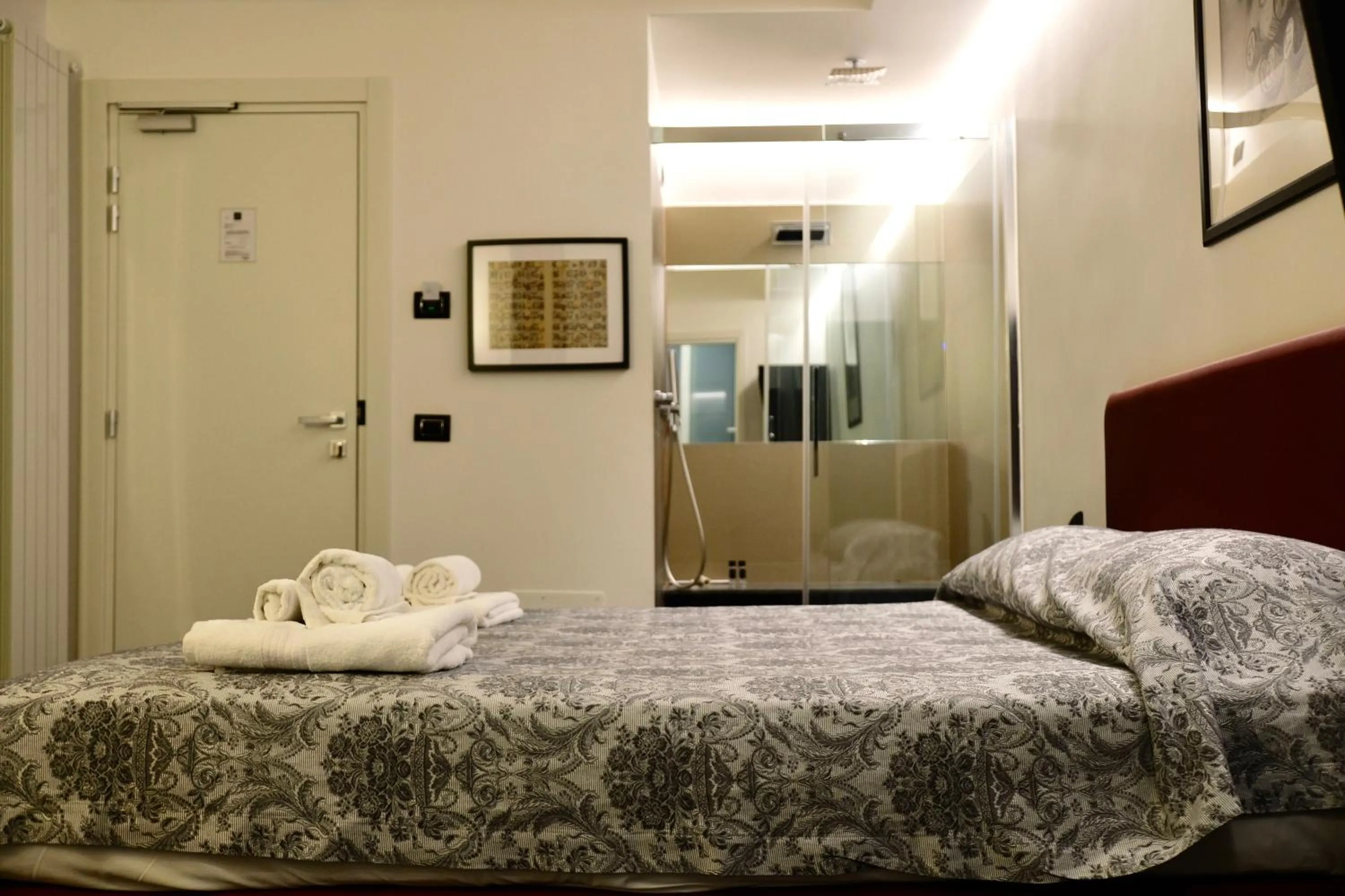 Bed in The Boutique Napoli Suite