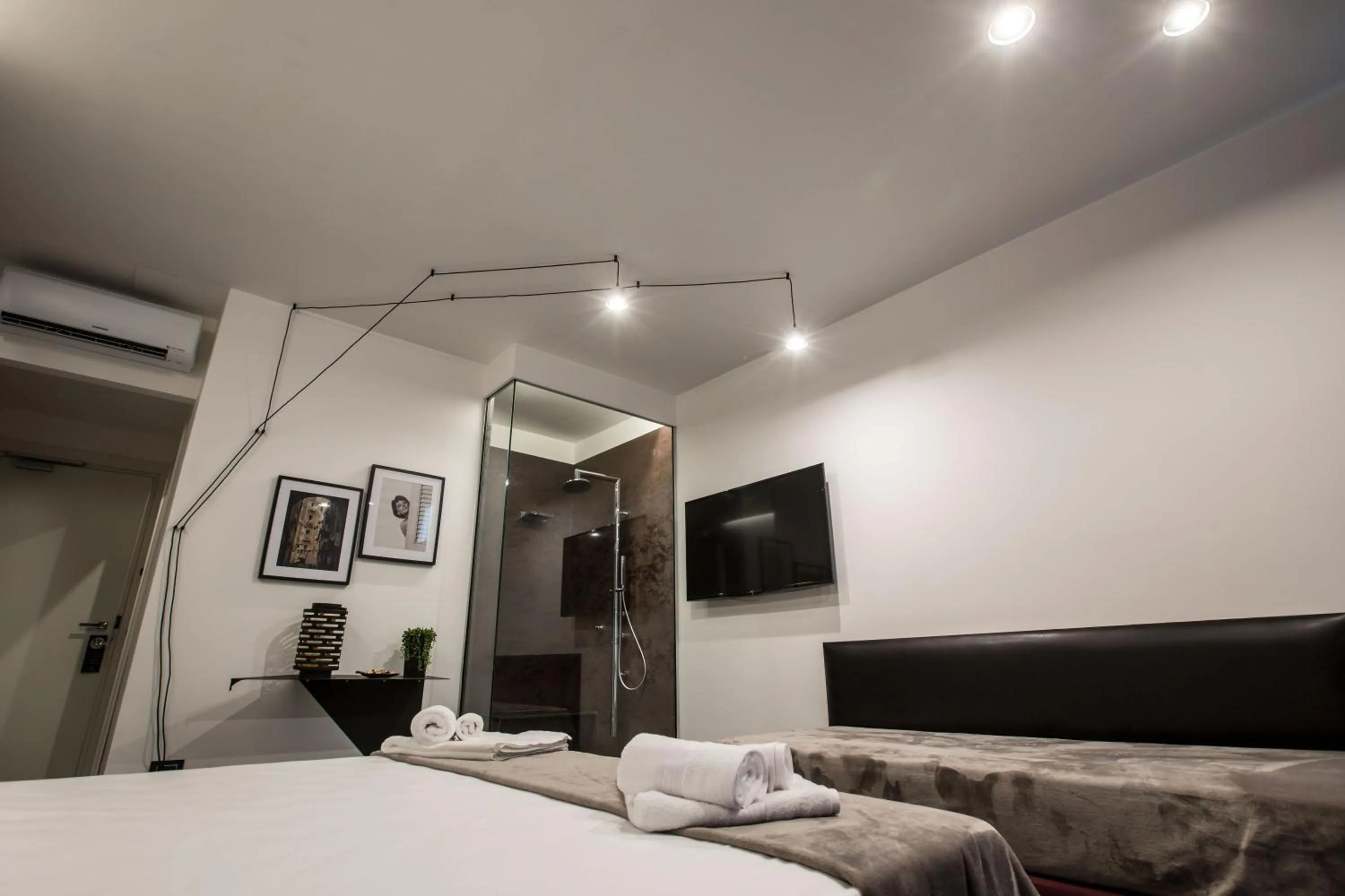 Bed in The Boutique Napoli Suite