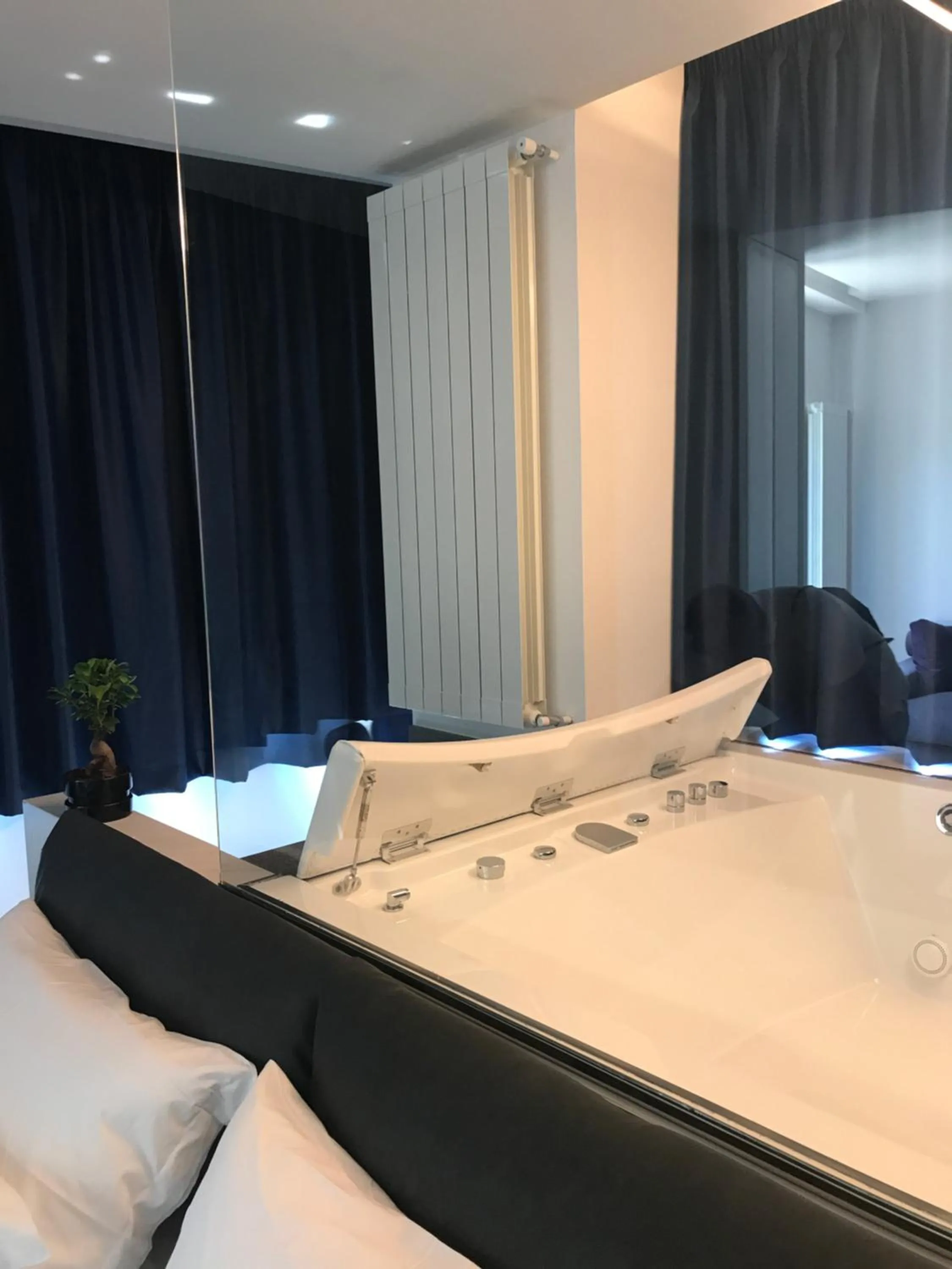 Bed in The Boutique Napoli Suite