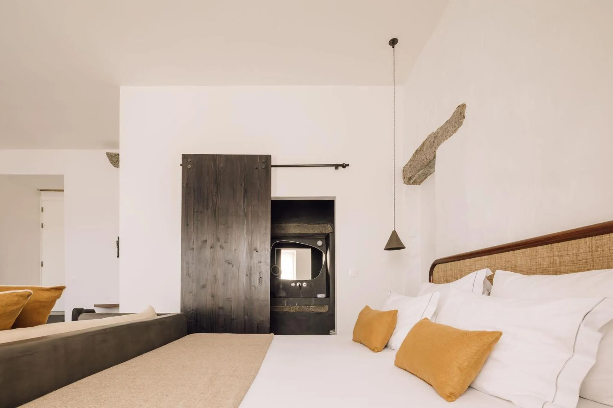 Bed in White Exclusive Suites & Villas