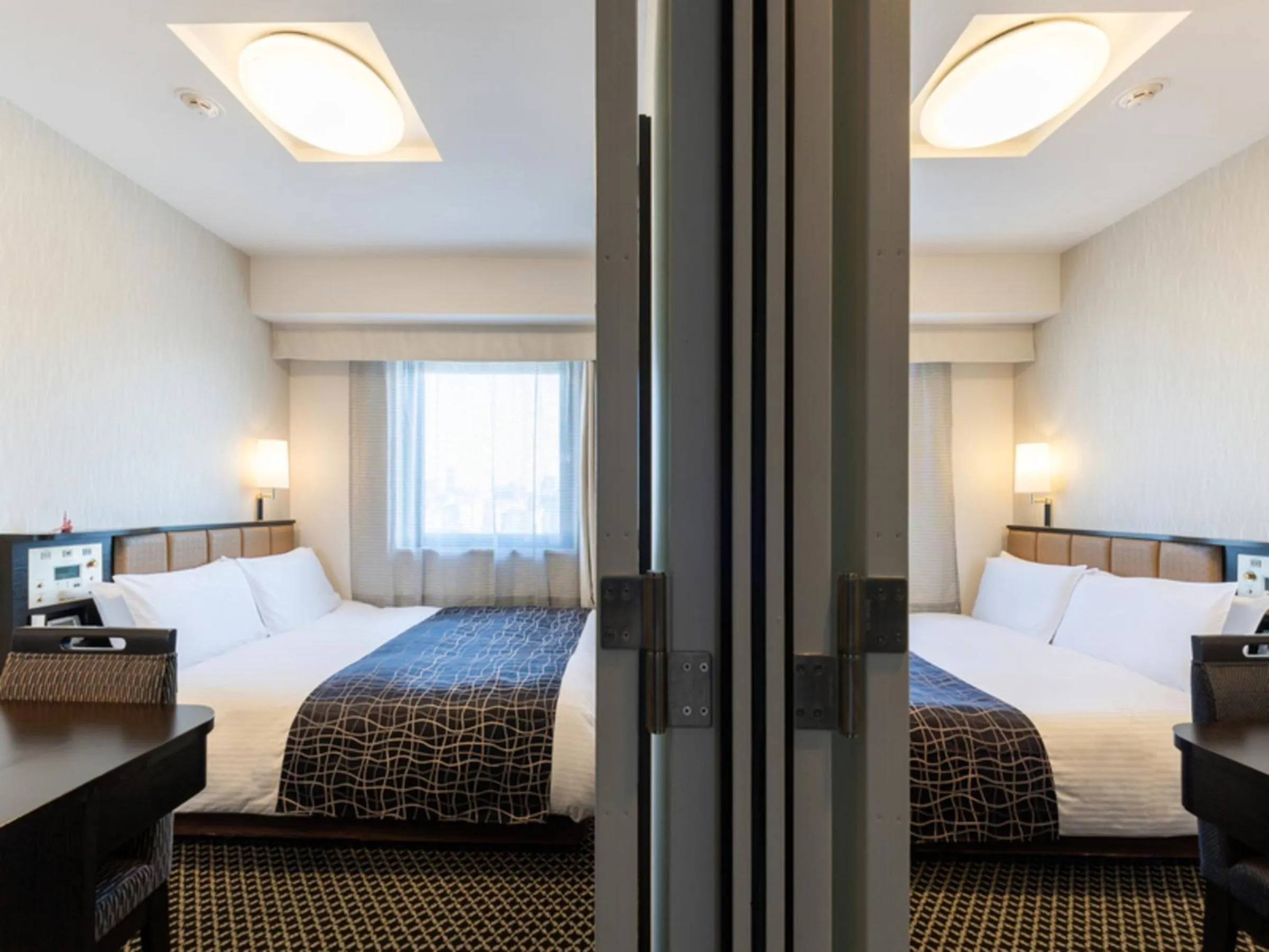 Photo of the whole room, Bed in APA Hotel Namba Ekihigashi