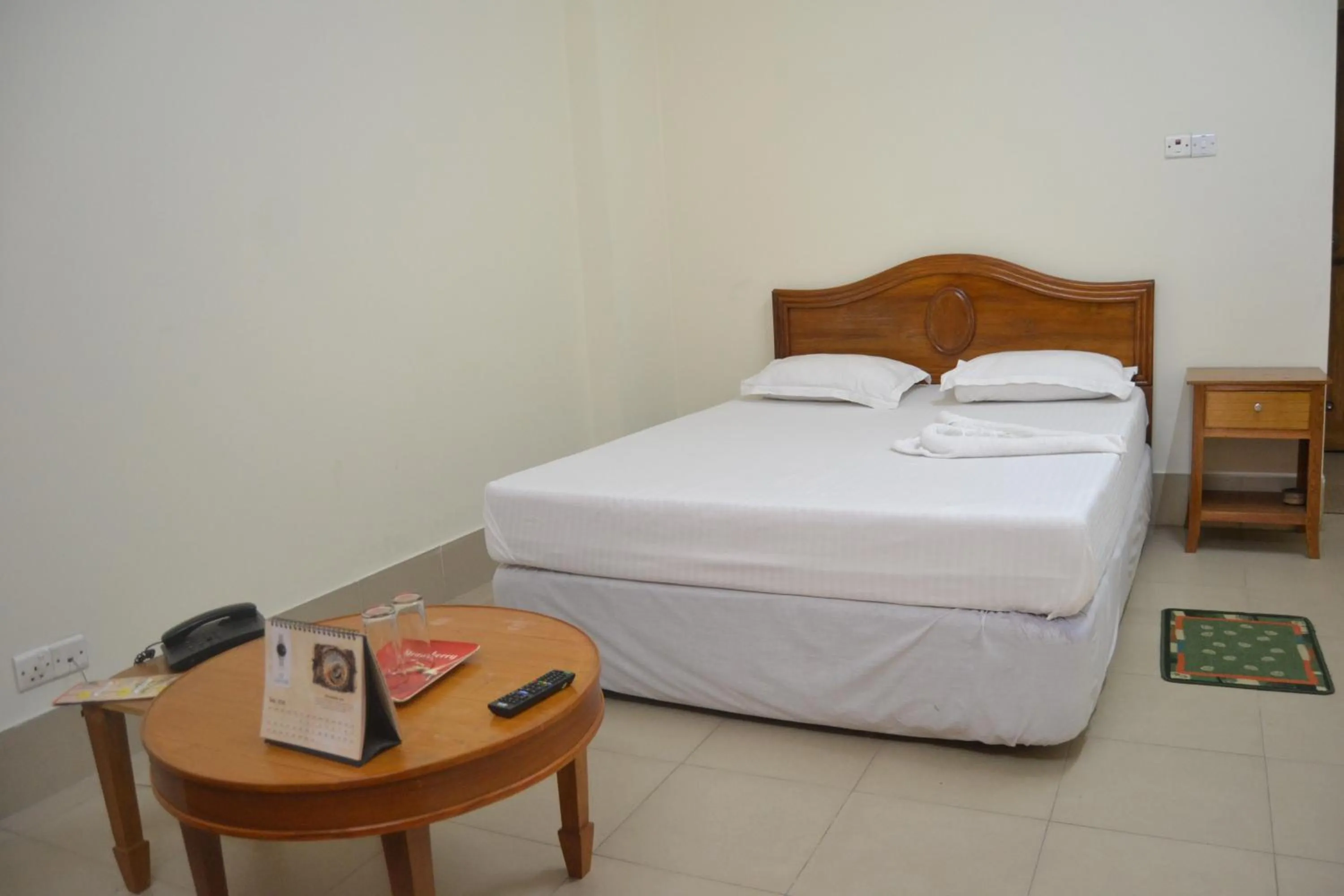 Bed in Hotel Marine Plaza