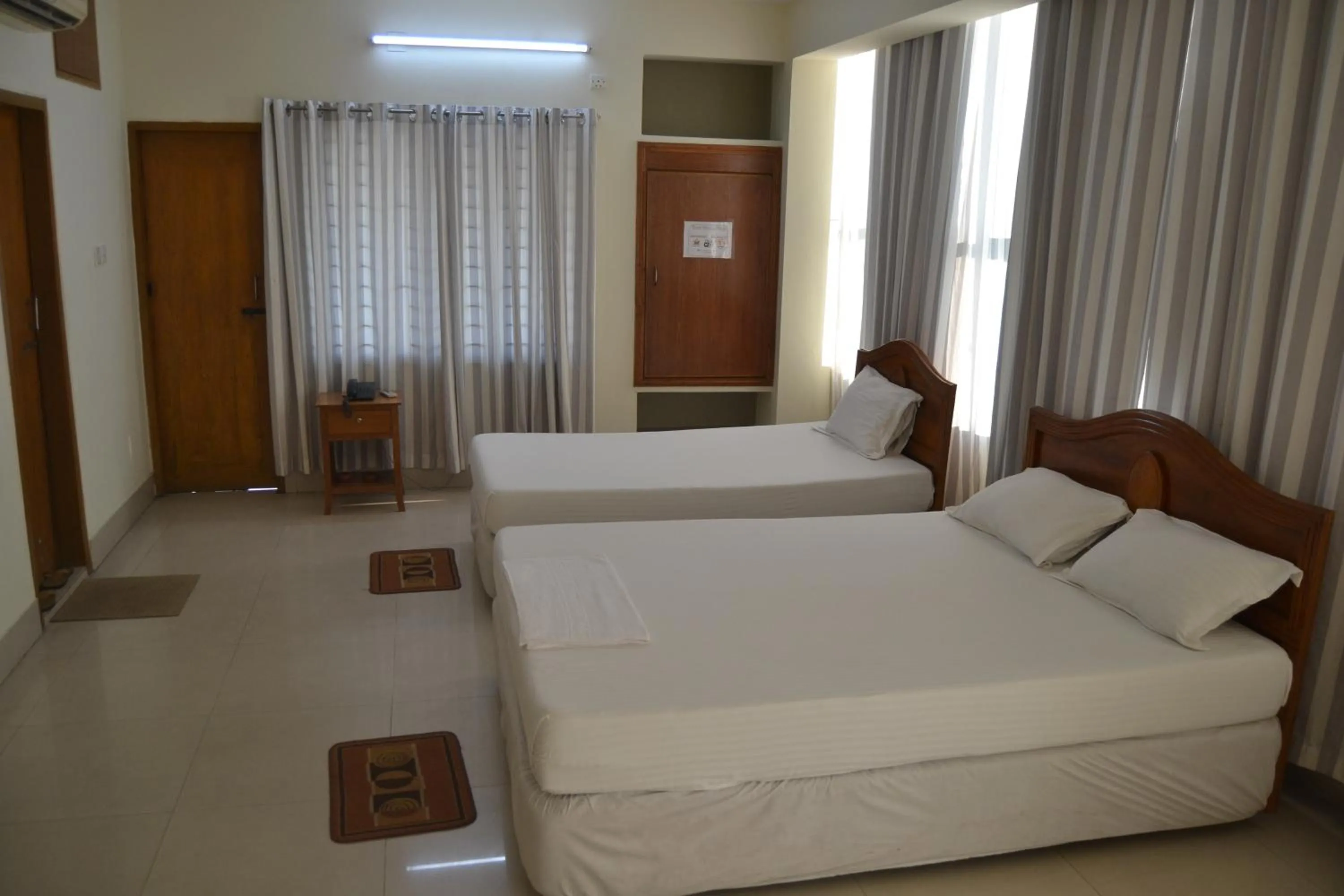 Bed in Hotel Marine Plaza