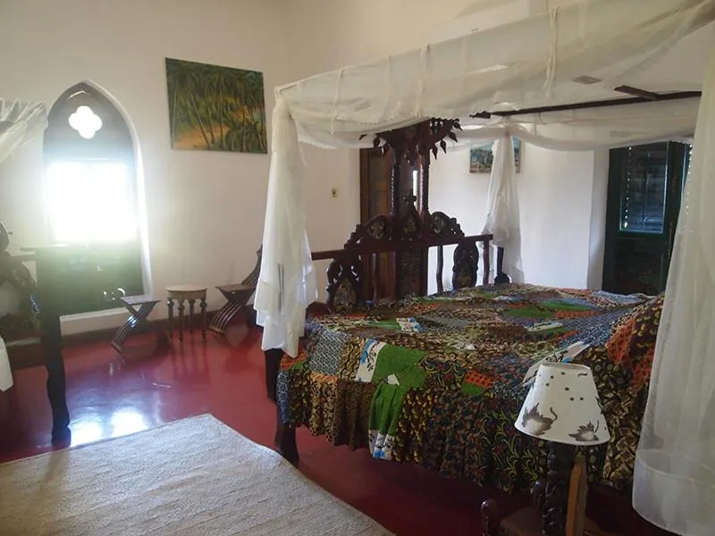 Bedroom in The Old Boma Hotel