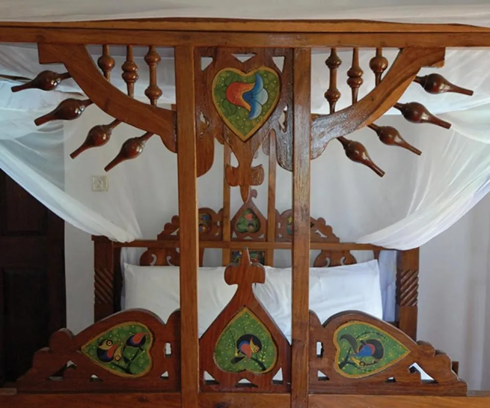 Bedroom in The Old Boma Hotel