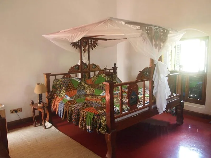 Bedroom in The Old Boma Hotel