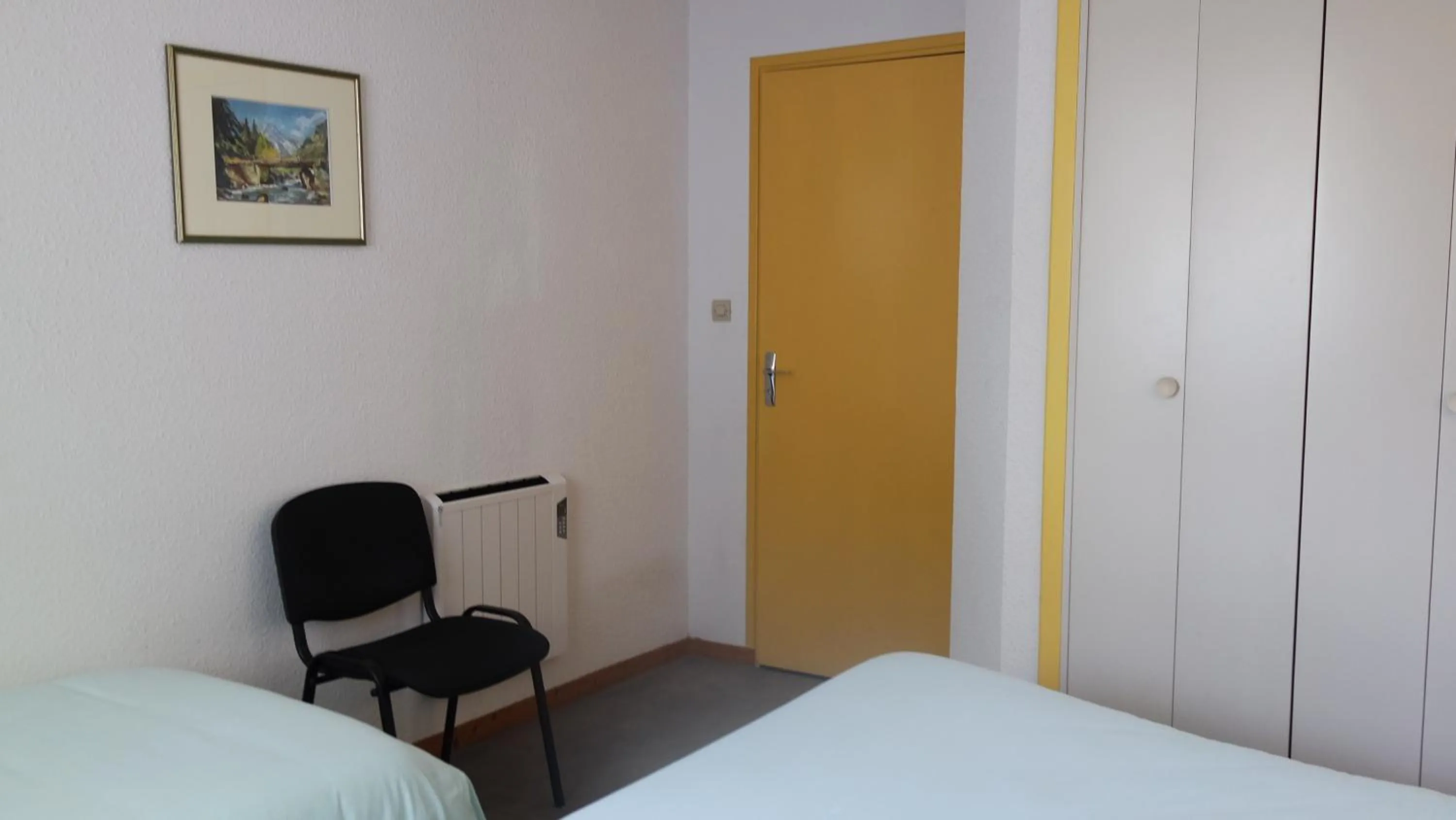 Photo of the whole room in Hôtel Le Tulipier