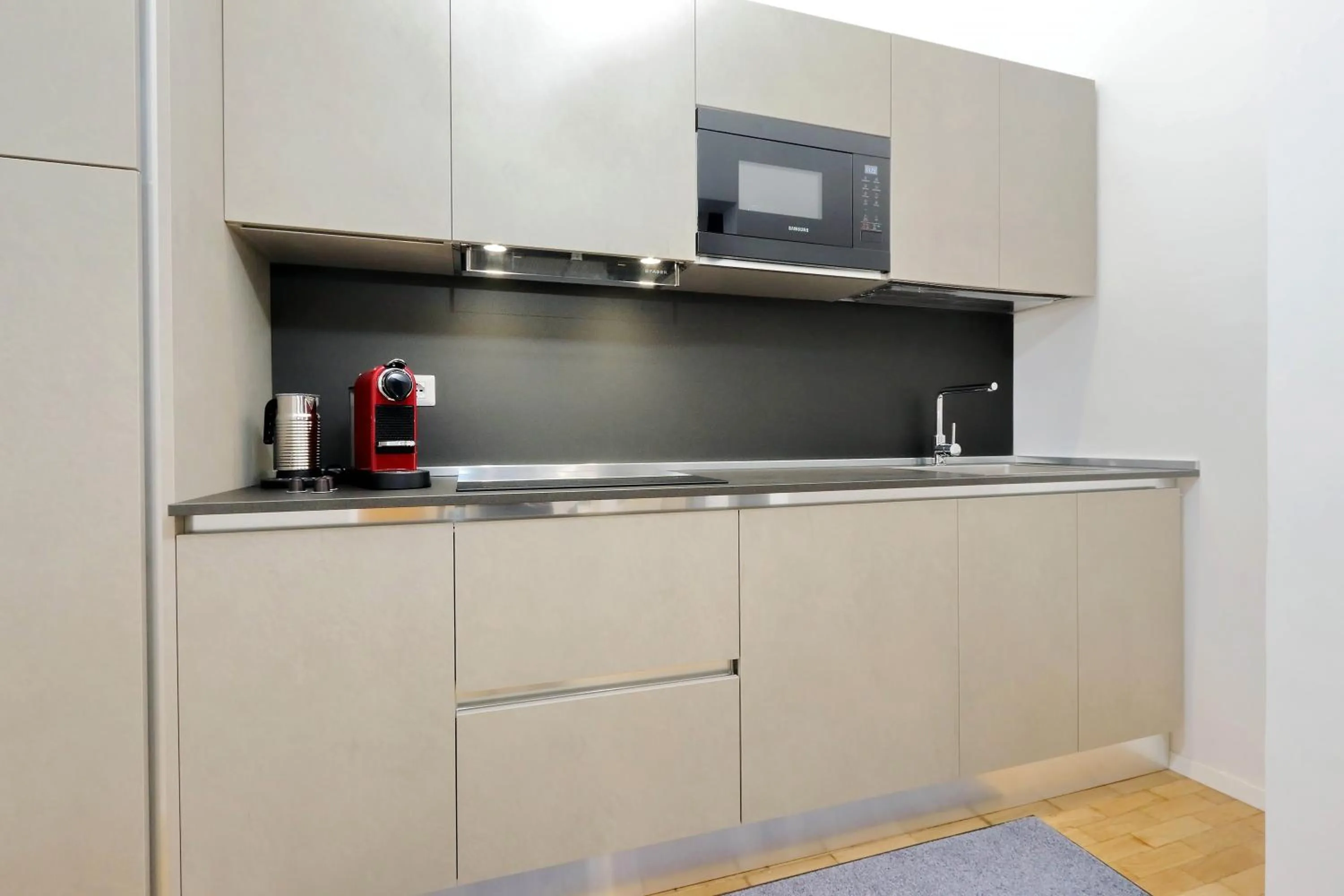 Kitchen or kitchenette in Propaganda Suites