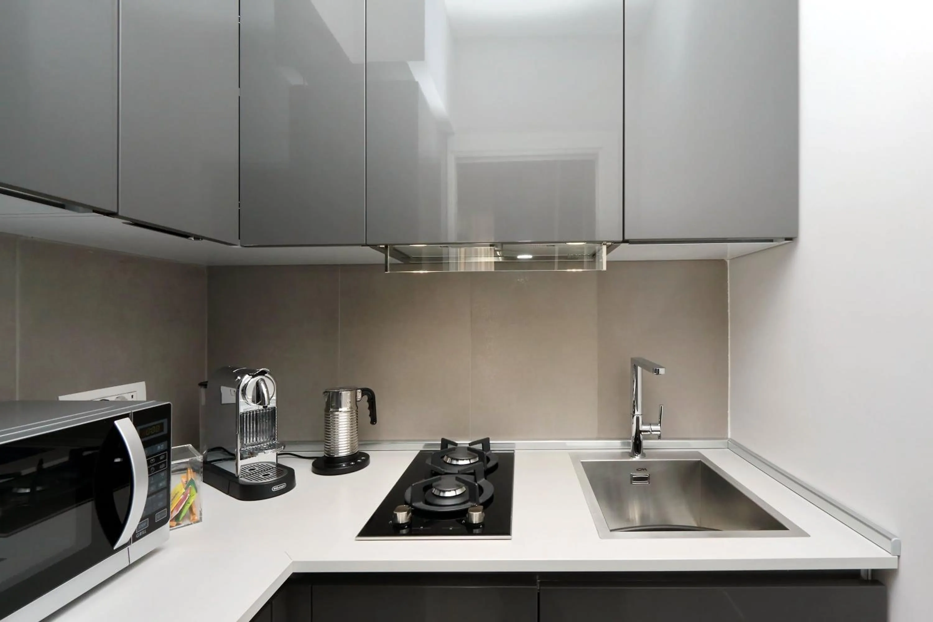 Kitchen or kitchenette in Propaganda Suites