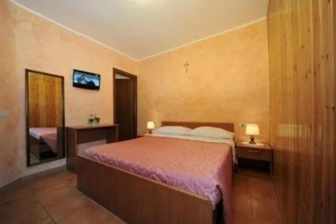 Bed in Albergo Pensione Paola