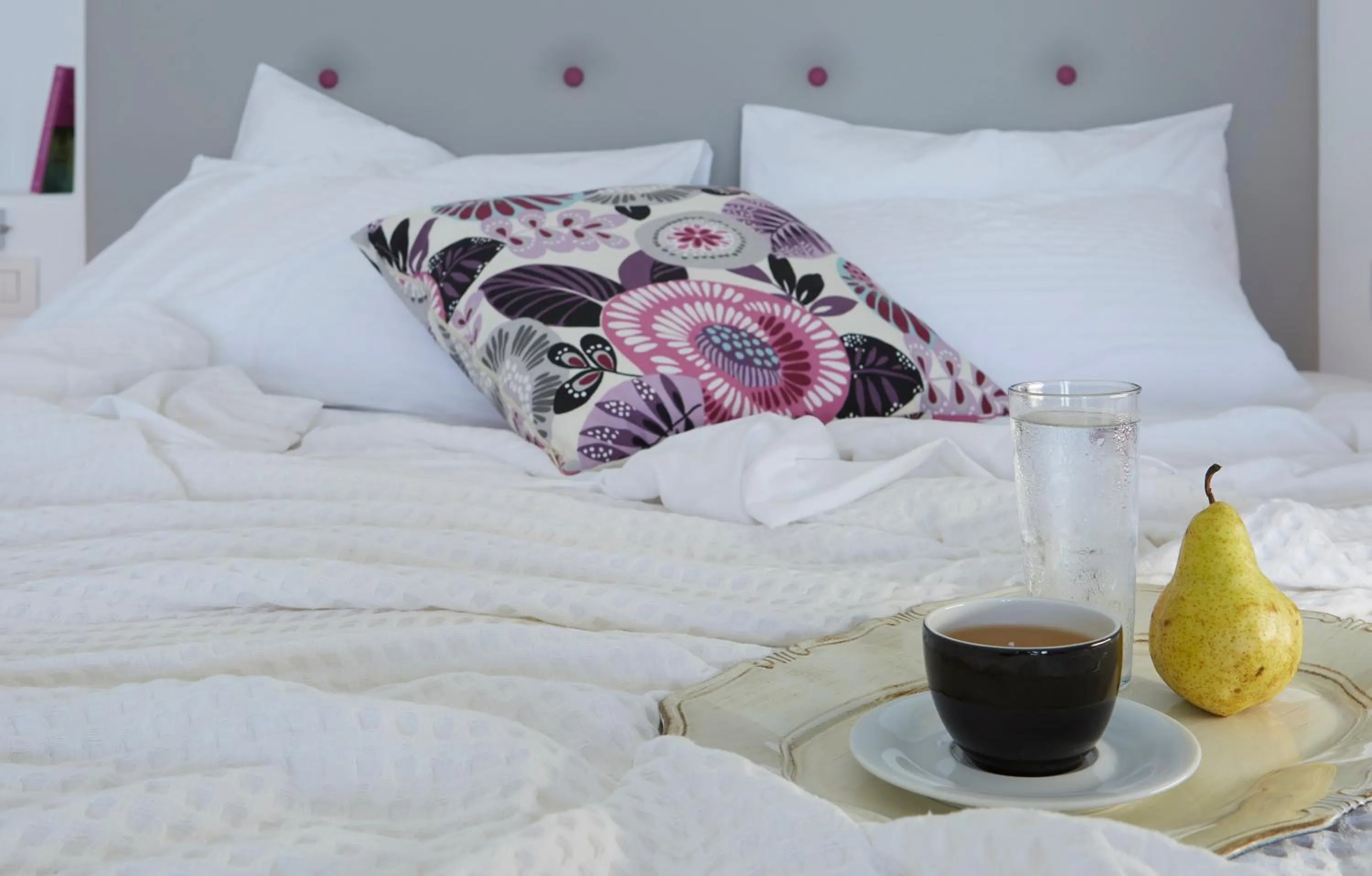 Bed in Aperanto Suites