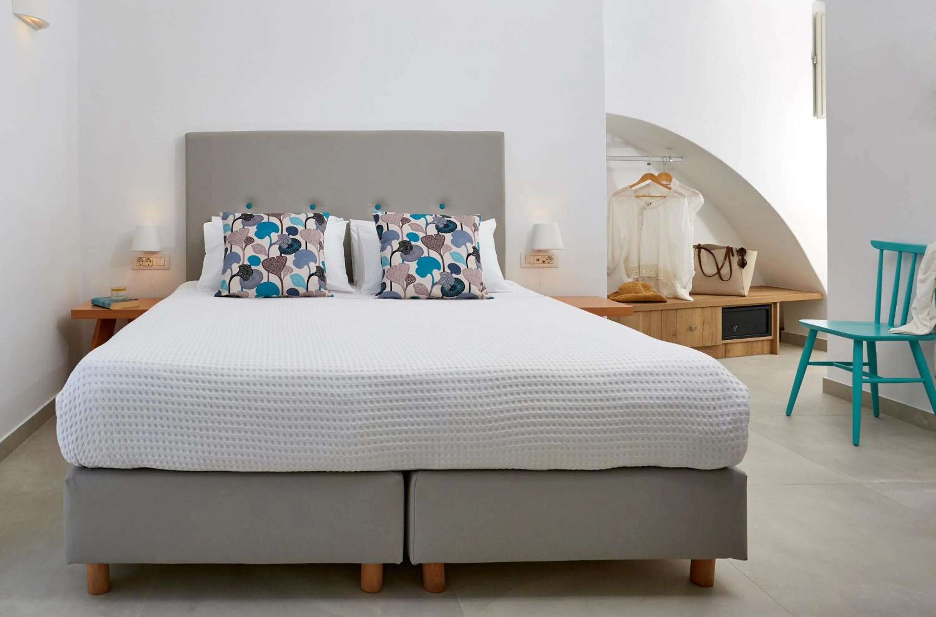 Bed in Aperanto Suites