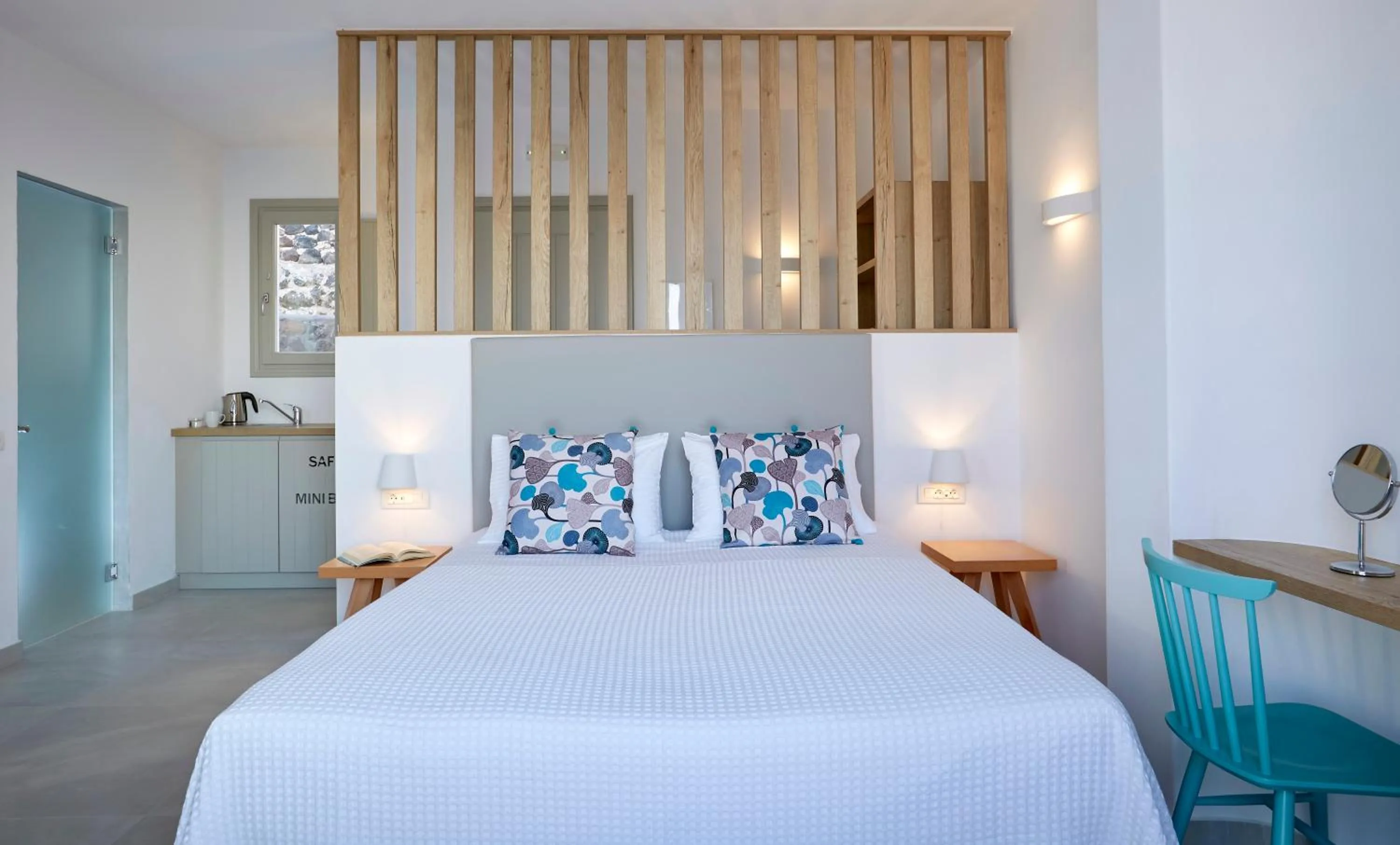 Bed in Aperanto Suites